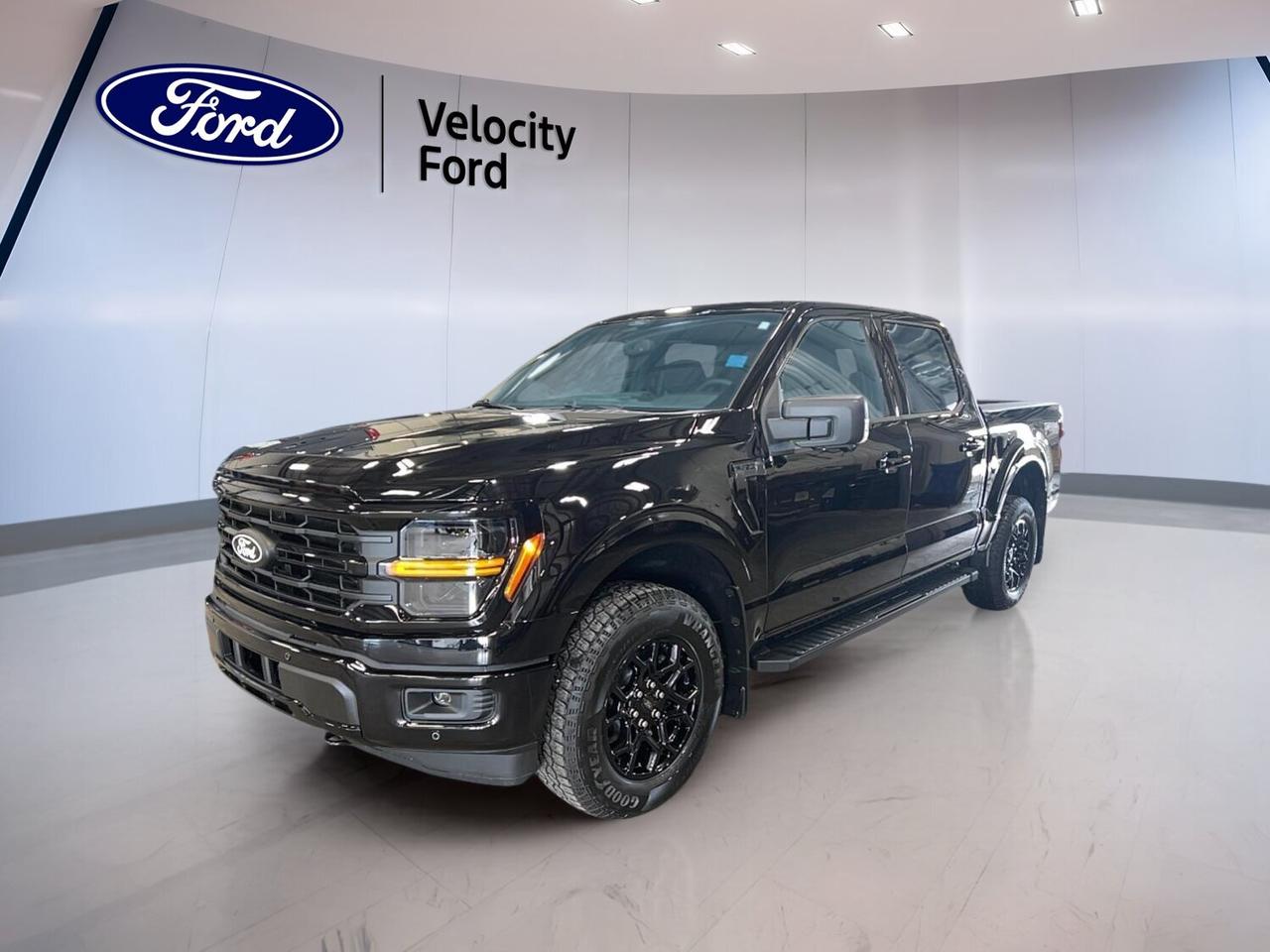 Meet the brand new 2026 Ford F-150 XLT 4WD SuperCrew 5.5 Box at Velocity Ford in Moose Jaw. Finished in Black with a Black interior, this full-size pickup blends proven V8 power, four full doors, and practical everyday comfort. It is built for work, travel, and Canadian weather with confidence.

This 2026 Ford F-150 XLT 4WD SuperCrew 5.5 Box comes with a 5.0-litre unleaded engine and an automatic transmission with dual shift mode. Its 4WD system, off-road tires, and rear tow hook help it handle rough roads and changing conditions. A towing capacity of 4,671 kg adds real truck capability.

FEATURES OF THE F-150 XLT 4WD SuperCrew 5.5 Box
»» Black exterior with bold truck presence
»» SuperCrew cab with four full doors
»» 5.5-foot box for daily utility
»» 5.0-litre V8 power with 4WD

TRUCK FEATURES
»» Tows up to 4,671 kg confidently
»» Rear tow hook supports truck utility
»» Off-road tires aid rough-surface traction
»» Short box suits city and jobsite

ADVANCED SAFETY FEATURES
»» Backup camera helps with reversing visibility
»» Blind spot monitor adds lane awareness
»» Lane departure warning supports safer travel
»» Stability control helps maintain vehicle balance

PERFORMANCE AND EFFICIENCY
»» 5.0-litre unleaded engine delivers strong output
»» Automatic transmission supports smooth daily driving
»» Dual shift mode adds driver control
»» Four-wheel drive boosts all-weather traction

COMFORT AND CONVENIENCE
»» Front air conditioning keeps cabin comfortable
»» Cruise control supports relaxed highway driving
»» Power windows add everyday ease
»» Driver lumbar support improves comfort

TECHNOLOGY AND CONNECTIVITY
»» Bluetooth integration supports hands-free calling
»» WiFi hotspot keeps devices connected
»» Satellite radio expands entertainment choices
»» Steering wheel audio controls add convenience

CARGO SPACE
»» 5.5-foot box handles daily hauling needs
»» SuperCrew cabin adds secure interior storage
»» Rear trunk access supports loading convenience
»» Spare tire adds roadside peace of mind

WHAT OTHER OWNERS LIKE
»» Strong V8 power for towing confidence
»» Spacious crew cab for family use
»» User-friendly controls for daily driving
»» Four-wheel drive for winter confidence

The brand new 2026 Ford F-150 XLT 4WD SuperCrew 5.5 Box is a smart fit for drivers who want real pickup strength without giving up comfort and easy-to-use features. Heated mirrors, electric mirrors, fog lights, automatic headlights, tinted windows, and LED headlamps add value where it counts.

Inside, this 2026 Ford F-150 XLT 4WD SuperCrew 5.5 Box offers practical function for busy days. Power steering, adjustable steering wheel settings, child safety locks, tire pressure monitoring, passenger airbag sensor, head side airbags, and side impact airbags all help support peace of mind on every trip.

If you need a brand new truck in Moose Jaw that can tow, carry, and commute with ease, this 2026 Ford F-150 XLT 4WD SuperCrew 5.5 Box deserves a closer look at Velocity Ford. It delivers proven Ford truck capability, useful technology, and the everyday versatility that makes an F-150 a trusted choice.

This 2026 Ford F-150 XLT 4WD SuperCrew 5.5 Boxs VIN is: 1FTFW3L57TKE48732.