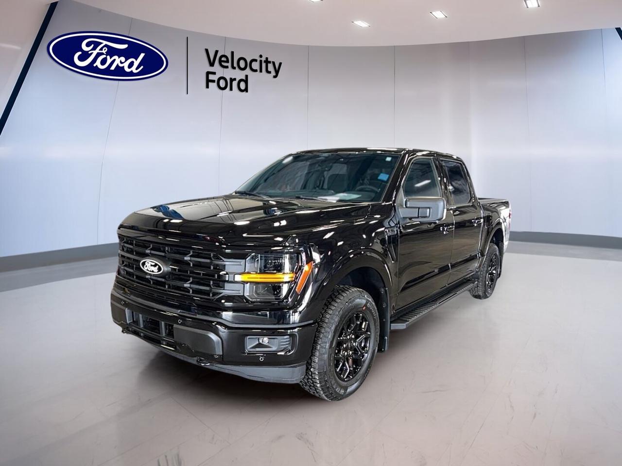 Meet the brand new 2026 Ford F-150 XLT 4WD SuperCrew 5.5 Box at Velocity Ford in Moose Jaw. This full-size truck blends proven capability, smart safety, and everyday comfort in one hard-working package. Finished in Black with a Black interior, it has four doors, automatic transmission, and a 2.7-litre unleaded engine.

Built for drivers who need a truck that can handle work and family life, the 2026 Ford F-150 XLT 4WD SuperCrew 5.5 Box delivers strong towing ability, confident four-wheel drive traction, and a roomy cabin. Its 5.5-foot box adds practical utility, while the XLT trim brings popular features that make each trip easier.

FEATURES OF THE F-150 XLT 4WD SuperCrew 5.5 Box
»» Black exterior with bold truck presence
»» SuperCrew cab with four full doors
»» 5.5-foot box for daily versatility
»» 2.7-litre engine with automatic transmission

TRUCK FEATURES
»» Tows up to 4,671 kg confidently
»» Four-wheel drive for added traction
»» Rear tow hook supports truck utility
»» Off-road tires add rugged capability

ADVANCED SAFETY FEATURES
»» Backup camera helps with reversing views
»» Blind spot monitor adds lane awareness
»» Lane departure warning supports safer travel
»» Stability control helps maintain secure handling

PERFORMANCE AND EFFICIENCY
»» 2.7-litre unleaded engine balances power well
»» Automatic transmission delivers smooth shifting
»» Dual shift mode adds driving control
»» Power steering supports easy manoeuvring daily

COMFORT AND CONVENIENCE
»» Front air conditioning keeps cabin comfortable
»» Cruise control helps on longer drives
»» Power windows add everyday convenience
»» Driver lumbar support improves comfort

TECHNOLOGY AND CONNECTIVITY
»» Bluetooth integration supports hands-free calling
»» WiFi hotspot keeps devices connected
»» Satellite radio expands entertainment choices
»» Steering wheel audio controls add ease

CARGO SPACE
»» 5.5-foot box handles useful gear loads
»» SuperCrew cabin adds secure interior storage
»» Rear trunk access supports cargo reach
»» Spare tire adds practical backup support

WHAT OTHER OWNERS LIKE
»» Strong towing for work and weekends
»» Spacious cab for passengers and gear
»» User-friendly technology for daily driving
»» Confident four-wheel drive in tough conditions

The 2026 Ford F-150 XLT 4WD SuperCrew 5.5 Box is well equipped with practical features that matter every day. It includes heated mirrors, electric mirrors, tinted windows, automatic headlights, fog lights, LED headlamps, anti-lock braking system, tire pressure monitoring, child safety locks, driver and passenger airbags, side impact airbags, head side airbags, and automatic door locks.

This truck is a smart choice for drivers who want modern safety, useful connectivity, and real capability without unnecessary complexity. From jobsite tasks to highway travel, the 2026 Ford F-150 XLT 4WD SuperCrew 5.5 Box offers the strength, comfort, and confidence expected from a new Ford truck at Velocity Ford in Moose Jaw.

This 2026 Ford F-150 XLT 4WD SuperCrew 5.5 Boxs VIN is: 1FTEW3LP3TKE68943.