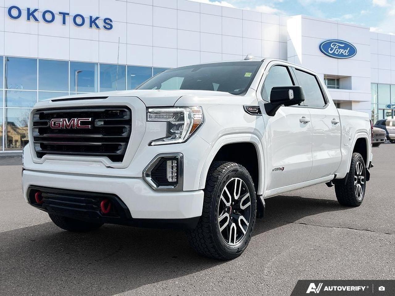 <p>This <strong>2022 GMC Sierra 1500 Limited AT4</strong> has spent its life registered locally in Alberta with personal previous use, making it ready for its next home. Driven by a powerful <strong>6.2L EcoBoost V8 engine</strong>, this capable pickup truck is built to handle heavy towing, tough job sites, and weekend road trips with complete peace of mind. It arrives fresh from a comprehensive mechanical assessment, ensuring it is fully prepared for the road ahead.</p><ul><li><p>Replaced the <strong>windshield</strong> via All Makes Glass for crystal-clear visibility.</p></li><li><p>Replaced both the <strong>engine air filter and cabin air filter</strong> to ensure optimal airflow and cabin comfort.</p></li><li><p>Replaced a burnt <strong>left licence plate bulb</strong> for proper exterior illumination.</p></li><li><p>Completed a thorough <strong>oil and filter change</strong> alongside a shampoo of the oil around the rear engine.</p></li><li><p>Performed professional <strong>wheel lock services</strong> and etched the vehicle for added security.</p></li></ul><p>According to the Carfax Canada history report, this Sierra carries a clean history with <strong>no reported accidents or damage</strong> and a normal Alberta registration. It features an extensive maintenance history with numerous service records documented across local dealerships and service centers.</p><ul><li><p><strong>AT4 Off-Road Suspension</strong> designed to handle rugged trails, dirt roads, and uneven job sites with ease.</p></li><li><p><strong>Robust 4x4 Capability</strong> providing exceptional traction and control through changing weather and road conditions.</p></li><li><p><strong>Healthy Tire Tread</strong> featuring solid 8/32" tread depth across all four corners for dependable road grip.</p></li><li><p><strong>Substantial Brake Health</strong> with strong 8mm front and 10mm rear measurements ensuring reliable stopping power.</p></li><li><p><strong>User-Friendly Infotainment Interface</strong> offering seamless smartphone connectivity to keep you entertained and connected on the go.</p></li><li><p><strong>Spacious Crew Cab Amenities</strong> providing practical storage solutions and gear that matters for everyday driving comfort.</p></li></ul><p>Text or Call us today at Okotoks Ford Lincoln for a personalized video walk-around or to book your test drive of this vehicle.</p>