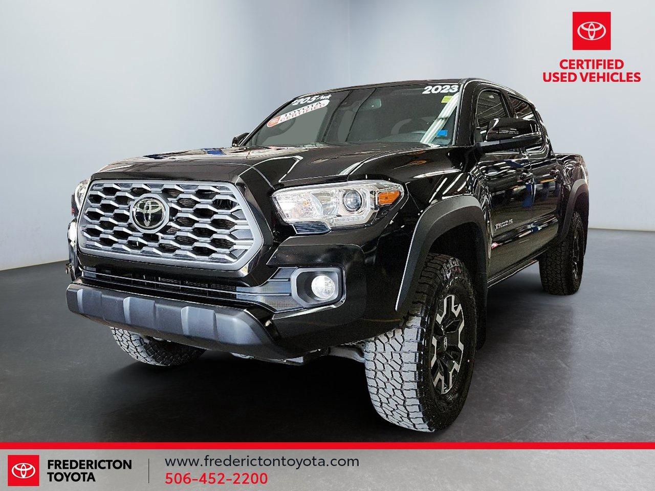 Enhance your safety with dependable features including advanced airbag protection, Lane Departure Warning, Front Collision Mitigation, Adaptive Cruise Control, a Back-Up Camera, Stability Control, and Brake Assist.

Keep you and your passengers bundled up and cozy with dual-zone climate control, heated front seats, a power drivers seat with lumbar support, and a leather-wrapped steering wheel.

Never experience a boring drive with keyless entry and push-button start, Bluetooth, satellite radio, steering wheel audio controls, power windows and locks, and smart device integration.

This vehicle was made for all the hard work you need with strong features such as tow hitch and tow hooks, aluminum wheels, privacy glass, sliding rear window, automatic headlights, and a tire pressure monitoring system.

Thank you for choosing Fredericton Toyota, welcome to the family, and we look forward to being here for you every step of your ownership journey.