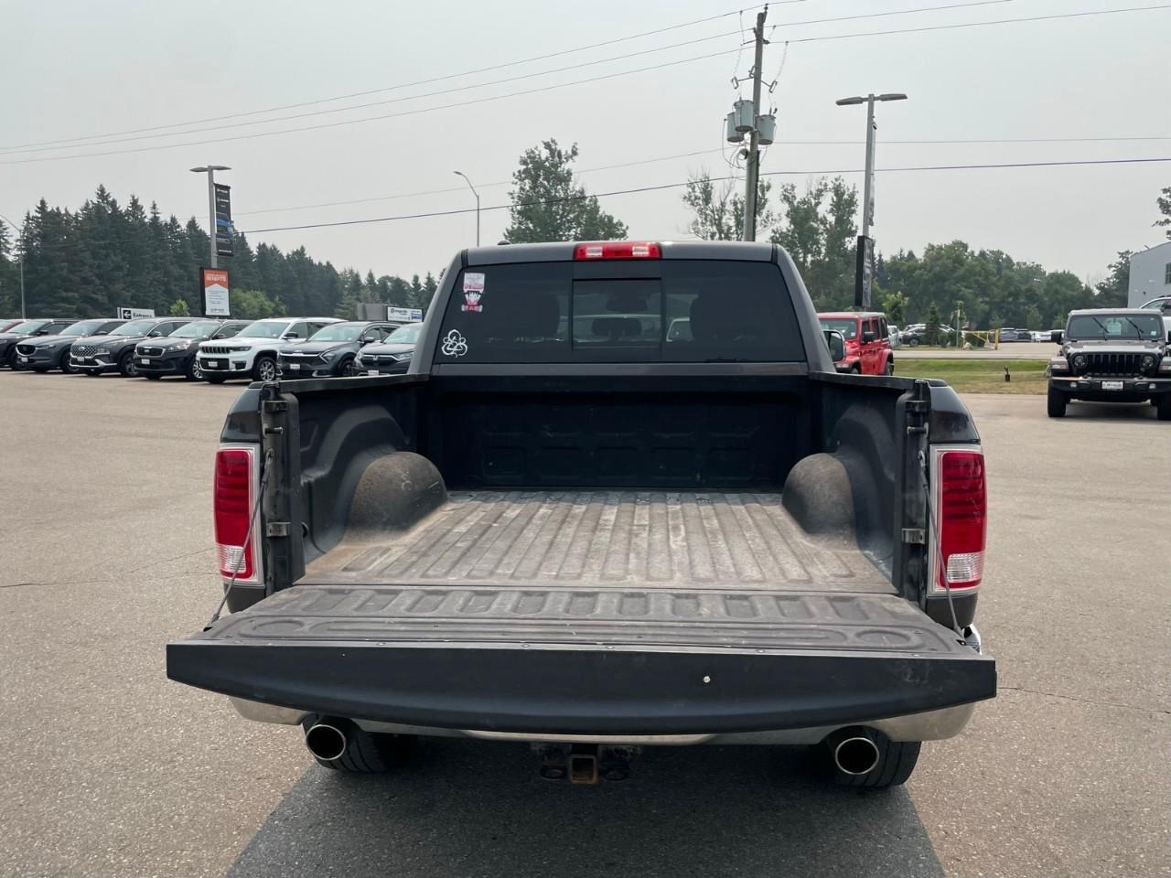2016 RAM 1500 4WD Crew Cab 140.5  Laramie Photo