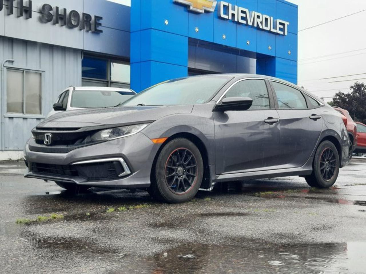 Recent Arrival! Gray 2020 Honda Civic LX For Sale, Bridgewater FWD CVT 2.0L I4 DOHC 16V i-VTEC Cloth, 8 Speakers, ABS brakes, Air Conditioning, Brake assist, Bumpers: body-colour, Delay-off headlights, Driver door bin, Electronic Stability Control, Emergency communication system, Exterior Parking Camera Rear, Front anti-roll bar, Front Bucket Seats, Fully automatic headlights, Heated door mirrors, Heated Front Bucket Seats, Illuminated entry, Occupant sensing airbag, Outside temperature display, Power door mirrors, Power steering, Power windows, Radio data system, Rear window defroster, Remote keyless entry, Security system, Speed control, Speed-sensing steering, Tachometer, Telescoping steering wheel, Tilt steering wheel, Traction control.