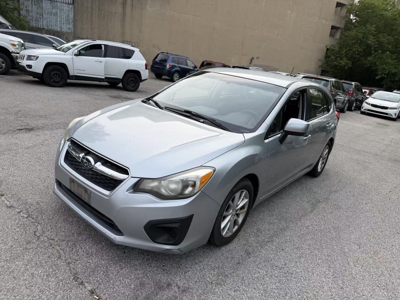 Used 2013 Subaru Impreza 5dr HB CVT 2.0i w/Touring Pkg for sale in Toronto, ON