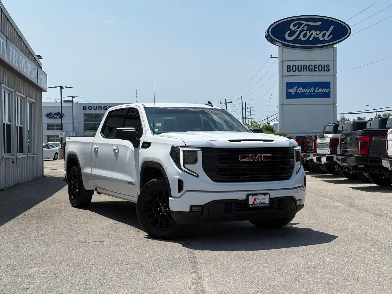 <p>Introducing the 2024 GMC Sierra 1500 Elevation in a pristine white finish, featuring a robust 4×4 drivetrain. This truck offers outstanding handling and power, making it the perfect companion for any adventure.</p><p>The exterior showcases a commanding presence with its black accents and stylish alloy wheels. Step inside to find a spacious interior with a black color scheme and heated seats for your comfort. The Sierra's functional elegance is matched by its practicality, offering air conditioning and power windows.</p><p>Stay connected and secure with cutting-edge technology such as a backup camera, navigation system, and smart device integration. Enjoy the convenience of keyless entry and remote start. The vehicle's safety features include lane assist and a reliable set of heated mirrors, ensuring your drive is both safe and comfortable. Meanwhile, the heated steering wheel adds a touch of premium comfort.</p><p>Built for those who demand reliability and style, the Sierra 1500 Elevation is ideal for anyone needing a powerful yet versatile truck. Contact Bourgeois Motors Ltd. today to find out how this magnificent vehicle can be yours.</p> <p><strong>Why Choose the Bourgeois Auto Group?</strong></p><p>For 80 years, Bourgeois Auto Group has been delivering exceptional automotive experiences. Our factor trained teams work to ensure you receive the shopping experience you deserve; whether you're looking for a new or new-to-you vehicle.</p><p>Shop 24/7 with our online showroom and chat service, ensuring convenience every step of the way. No hidden fees, full disclosure, and every pre-owned vehicle comes with a Carfax® report for peace of mind.</p><p>We offer a wide selection of pre-owned vehicles, all competitively priced using real-time market data. Get the best deal on your purchase and trade-in with our free Live Market Analysis report.</p><p>Looking to sell your car? We buy any make or modelno purchase required. Our simple to use online trade valuation tool will provide you with a clear, transparent selling experience whether you buy our car or not.</p><p>Backed by hundreds dedicated employees across 4 convenient locations, were here to meet all your automotive needs. Visit us in Midland or Parry Sound and explore our inventory or schedule your next service today.</p> <p><strong>Financing Your Next Vehicle with Bourgeois Motors Ford in Midland:</strong></p><p>At Bourgeois Motors Ford, we make financing your next vehicle simple and stress-free! Our team works with trusted lenders to find flexible options tailored to your budget. Drive away with confidenceapply today!</p><p>Take advantage of our online pre-qualification tool, backed by Equifax and TD Bank to find the payment that works for you. Simply <a href=https://www.bourgeoismotors.com/free-credit-check/ rel=nofollow><strong>CLICK HERE</strong></a><strong> </strong>to use our secure online credit tool with no impact to your credit.</p>