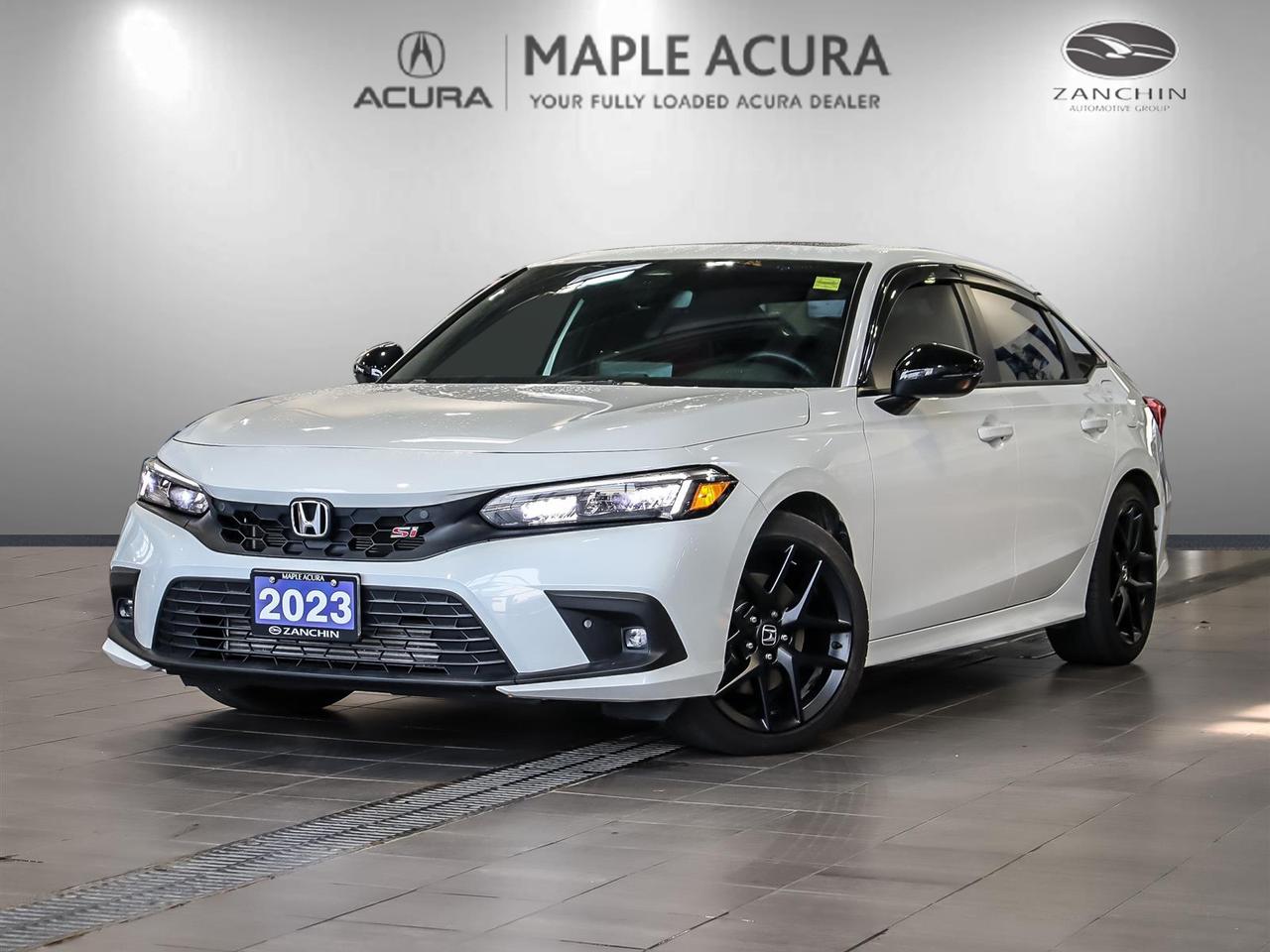 Lane Departure, Market Value Pricing, Not a Rental, Local Trade, 30 Day 1,000km safety related and 90 Day 5,000 km engine and transmission warranty, ** All vehicles are all in priced, No additional fees are applied., Black/Red Cloth, Apple CarPlay/Android Auto, Bose Premium Sound System, Bumpers: body-colour, Compass, Driver door bin, Exterior Parking Camera Rear, Front dual zone A/C, Fully automatic headlights, Garage door transmitter: HomeLink, Leather Shift Knob, Low tire pressure warning, Power windows, Speed-Sensitive Wipers, Spoiler, Wheels: 18 Matte Black Aluminum-Alloy.

Recent Arrival! 2023 Honda Civic Si
1.5L I4 Turbocharged DOHC 16V LEV3-ULEV50 200hp 6-Speed Manual FWD

Odometer is 40082 kilometers below market average!


** All vehicles are all in priced, No additional fees are applied. Buying an used vehicle from Maple Acura is always a safe investment. We know you want to be confident in your choice and we want you to be fully satisfied. Thats why ALL our used vehicles come with our limited warranty peace of mind package included in the price. No questions, no discussion - 30 days or 1,000 km safety related warranty 90 days or 5,000 kilometre powertrain coverage. From the day you pick up your new car you can rest assured that we have you covered.