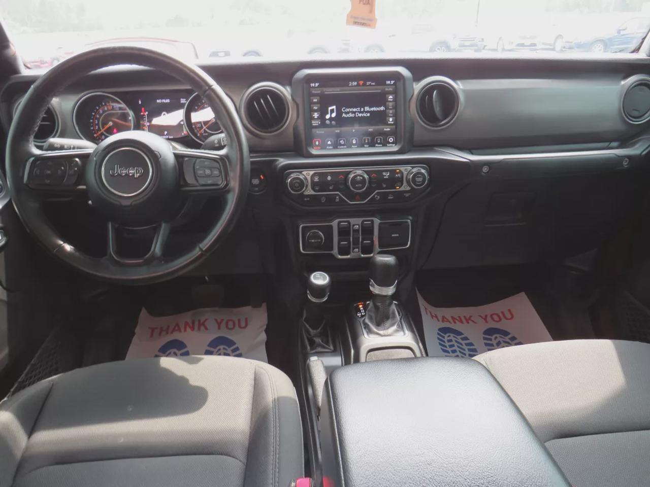 2021 Jeep Gladiator Sport | 4x4 | Automatic | Alloy Wheels | Removable Soft Top | Tow Hooks | Skid Plates | Air Conditioning | Cruise Control | Touchscreen Display | Android Auto & Apple CarPlay | USB-C Ports | Back-Up Camera | Steering Wheel Audio Controls | Heated Power Mi Photo