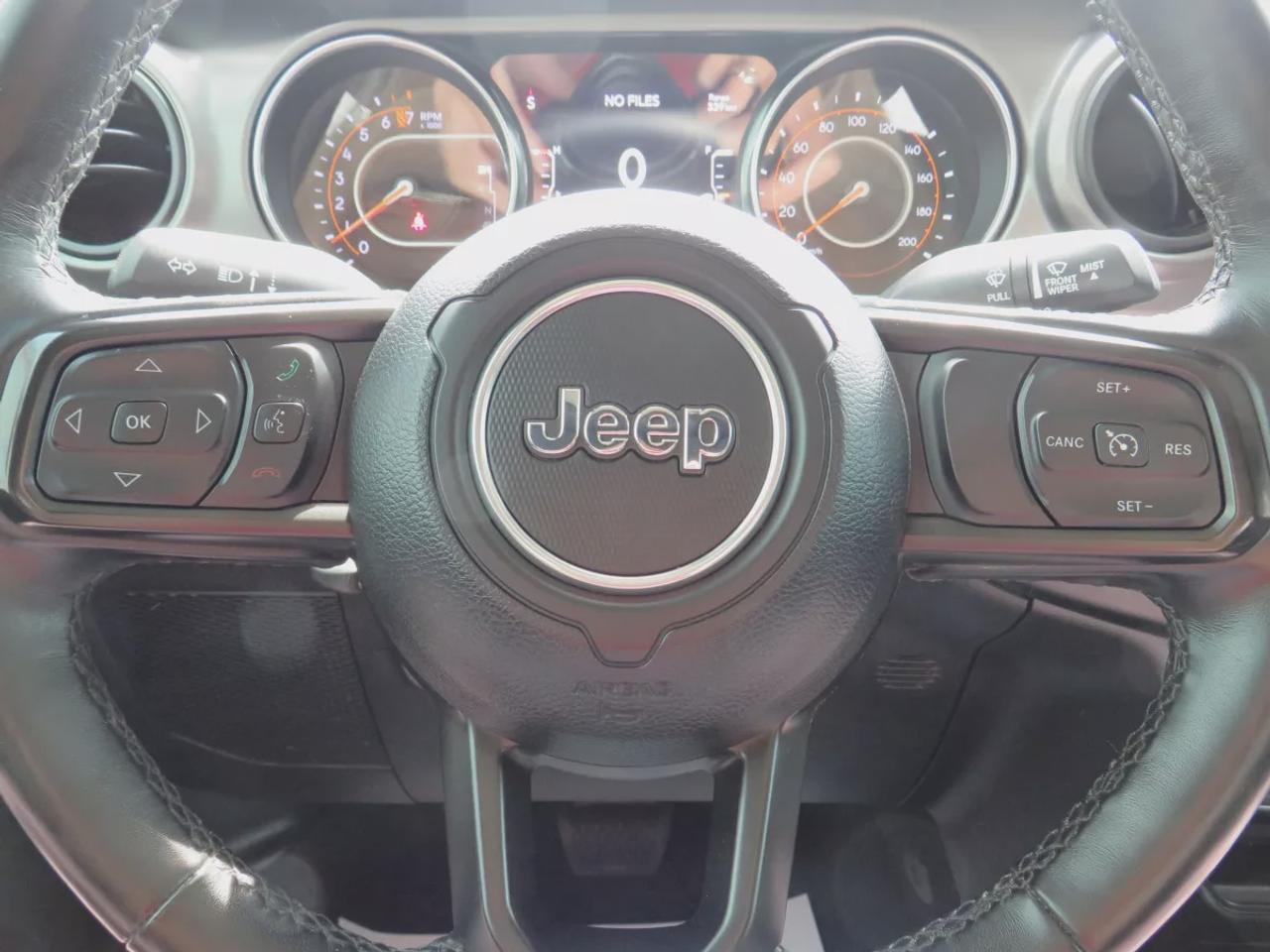 2021 Jeep Gladiator Sport | 4x4 | Automatic | Alloy Wheels | Removable Soft Top | Tow Hooks | Skid Plates | Air Conditioning | Cruise Control | Touchscreen Display | Android Auto & Apple CarPlay | USB-C Ports | Back-Up Camera | Steering Wheel Audio Controls | Heated Power Mi Photo