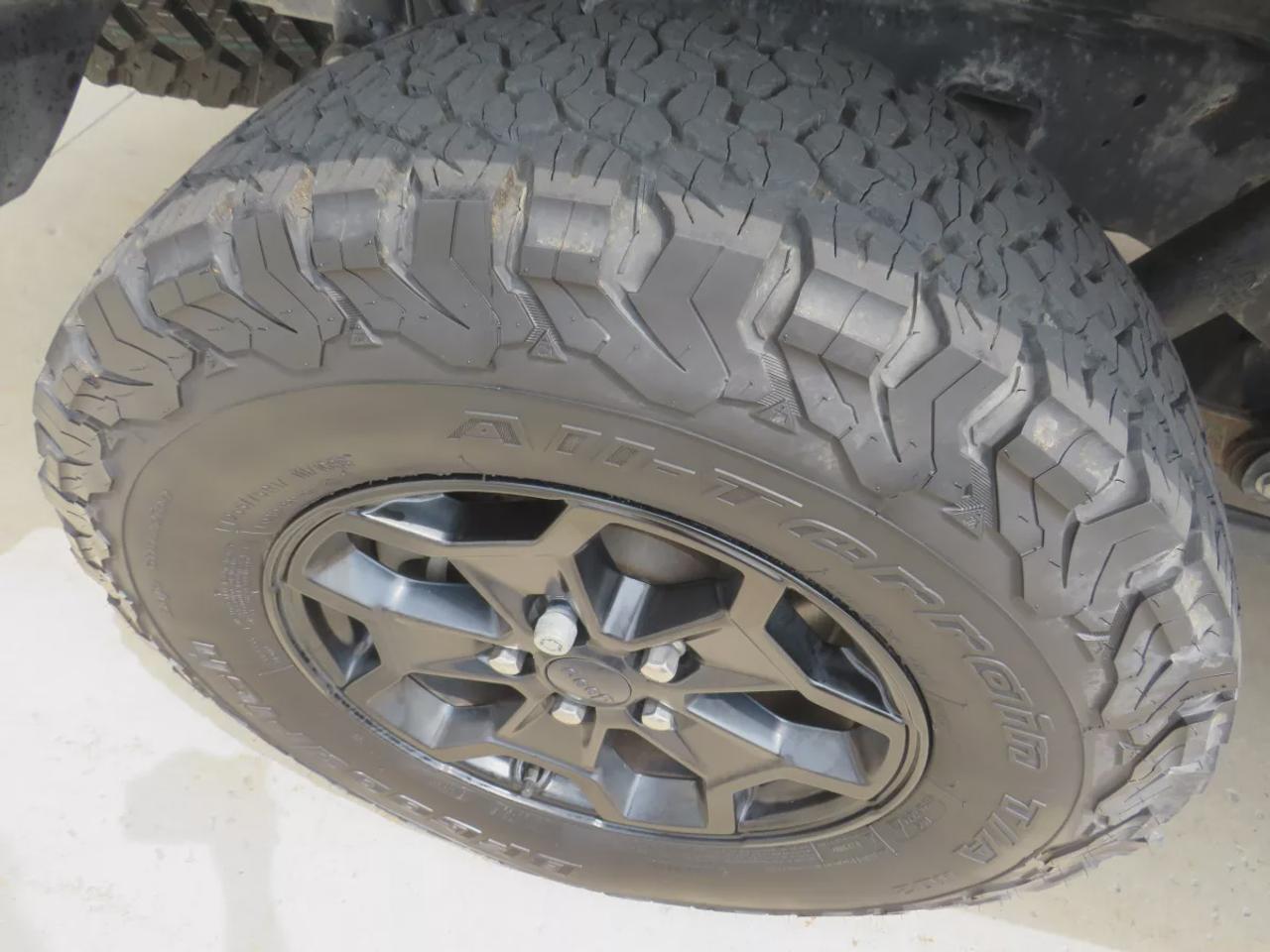 2021 Jeep Gladiator Sport | 4x4 | Automatic | Alloy Wheels | Removable Soft Top | Tow Hooks | Skid Plates | Air Conditioning | Cruise Control | Touchscreen Display | Android Auto & Apple CarPlay | USB-C Ports | Back-Up Camera | Steering Wheel Audio Controls | Heated Power Mi Photo