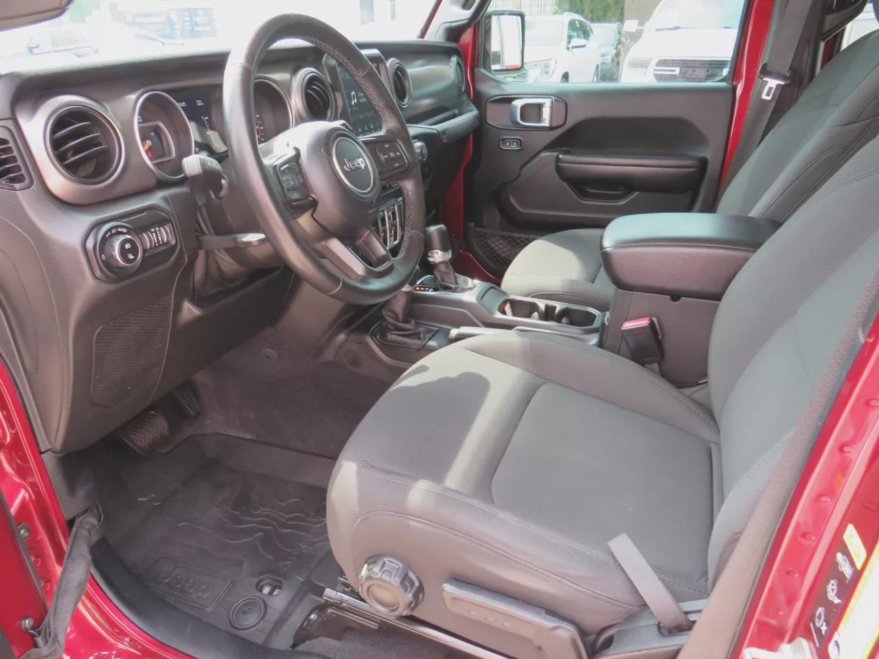 2021 Jeep Gladiator Sport | 4x4 | Automatic | Alloy Wheels | Removable Soft Top | Tow Hooks | Skid Plates | Air Conditioning | Cruise Control | Touchscreen Display | Android Auto & Apple CarPlay | USB-C Ports | Back-Up Camera | Steering Wheel Audio Controls | Heated Power Mi Photo