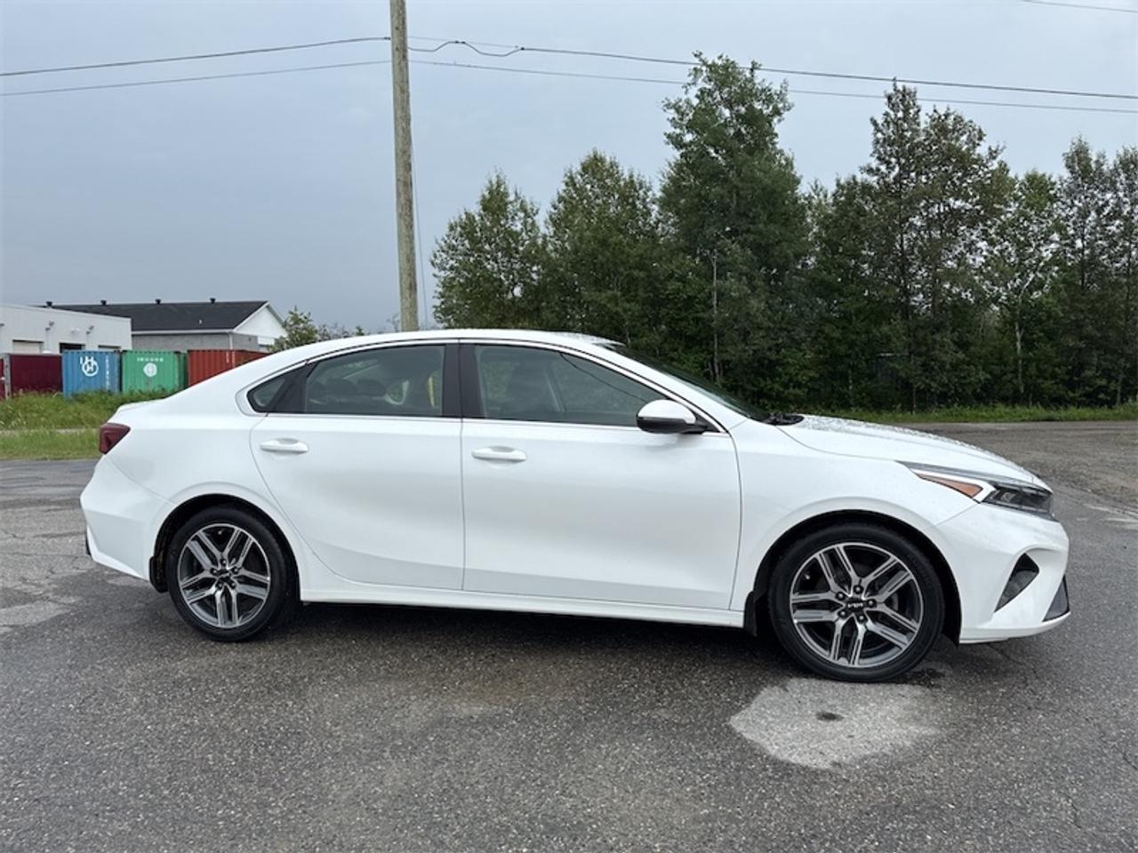 2023 Kia Forte EX+  Sunroof - $156 B/W Photo1