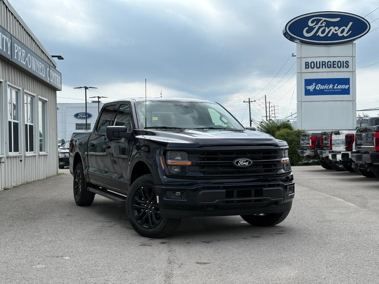 <p>Step into the future with this stunning 2026 Ford F-150 XLT 4WD SuperCrew, beautifully presented in a captivating blue, with unmatched handling offered by its capable 4×4 drivetrain. Its bold design is complemented by key enhancements, such as the Antimatter Blue Metallic finish and the striking Black Appearance Package, adding a distinct touch of sophistication with black exterior badging and dual exhausts.</p><p>The interior excites with elegant dark accents contrasted with sleek black cloth seating, offering comfort and style for all passengers. Experience convenience like never before with tray style floor liners paired with carpet mats, and smart storage solutions in the Bed Utility Package, including LED box lighting and storage boxes, making this truck not just functional but also versatile for any adventure.</p><p>This F-150 brims with modern technology from a powerful 3.5L V6 EcoBoost engine equipped with auto start/stop tech, to seamless Bluetooth connectivity and integrated smart devices ensuring a sophisticated ride. Safety is paramount, as evidenced by features such as lane assist, brake assist, and parking sensors, delivering peace of mind on every journey.</p><p>Perfectly suited for adventurous families or essential for the modern worksite, this vehicle offers practical solutions with style. Whether you're hauling, towing, or exploring rugged terrains, this F-150 exceeds expectations. Reach out to Bourgeois Motors Ltd. for more details and see how this exceptional truck can elevate your driving experience.</p> <p><span style=color:rgb( 58 , 80 , 95 )>The discount shown on vehicle represents the </span><u>Cash Purchase</u><span style=color:rgb( 58 , 80 , 95 )> discount and is inclusive of all non-stackable and stackable cash purchase discounts from Ford of Canada and Bourgeois Motors Ltd. and is offered in lieu of sub-vented lease or finance rates. To get details on current discounts applicable to this and other vehicles in our inventory for Lease and Finance customer, see a member of our team. All offers for lease or finance are On Approved Credit (OAC).While every effort is made to ensure the accuracy of discounts and programs, programs are subject to change without notice </span><span style=color:rgb( 119 , 119 , 119 )>and may not be accurate or completely current. While every reasonable effort is made to ensure the accuracy of this data, we are not responsible for any errors or omissions contained on these pages.</span></p> <p><strong>Why Choose the Bourgeois Auto Group?</strong></p><p>For 80 years, Bourgeois Auto Group has been delivering exceptional automotive experiences. Our factor trained teams work to ensure you receive the shopping experience you deserve; whether you're looking for a new or new-to-you vehicle.</p><p>Shop 24/7 with our online showroom and chat service, ensuring convenience every step of the way. No hidden fees, full disclosure, and every pre-owned vehicle comes with a Carfax® report for peace of mind.</p><p>We offer a wide selection of pre-owned vehicles, all competitively priced using real-time market data. Get the best deal on your purchase and trade-in with our free Live Market Analysis report.</p><p>Looking to sell your car? We buy any make or modelno purchase required. Our simple to use online trade valuation tool will provide you with a clear, transparent selling experience whether you buy our car or not.</p><p>Backed by hundreds dedicated employees across 4 convenient locations, were here to meet all your automotive needs. Visit us in Midland or Parry Sound and explore our inventory or schedule your next service today.</p> <p><strong>Financing Your Next Vehicle with Bourgeois Motors Ford in Midland:</strong></p><p>At Bourgeois Motors Ford, we make financing your next vehicle simple and stress-free! Our team works with trusted lenders to find flexible options tailored to your budget. Drive away with confidenceapply today!</p><p>Take advantage of our online pre-qualification tool, backed by Equifax and TD Bank to find the payment that works for you. Simply <a href=https://www.bourgeoismotors.com/free-credit-check/ rel=nofollow><strong>CLICK HERE</strong></a><strong> </strong>to use our secure online credit tool with no impact to your credit.</p>