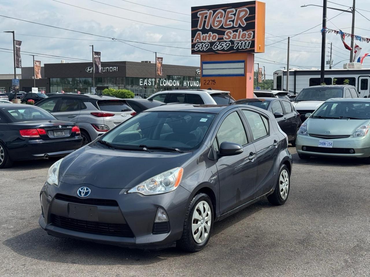 2012 Toyota Prius c HYBRID, HATCHBACK, GREAT ON FUEL, AS IS SPECIAL Photo