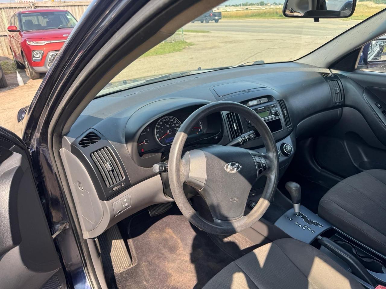 2009 Hyundai Elantra L, FUEL SAVER, WELL MAINTAINED, CERTIFIED Photo
