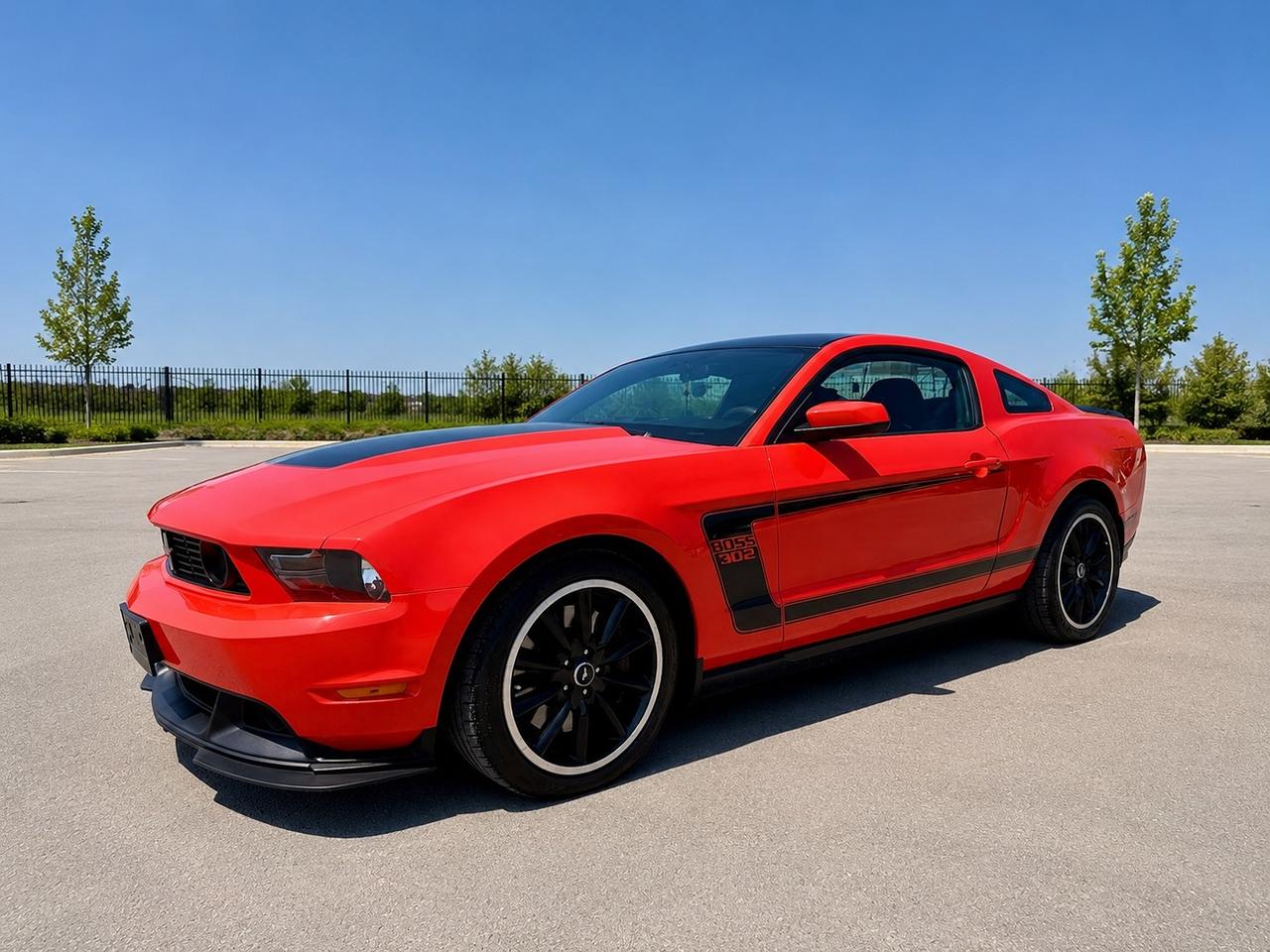 <h2>2012 Ford Mustang Boss 302 &ndash; Competition Orange | 58,850 KM</h2><h3><strong>$45,888 + HST & Licensing | Ontario Certified | Trade-Ins Welcome</strong></h3><p>The <strong>2012 Ford Mustang Boss 302</strong> is one of the most sought-after modern Mustangs ever produced. Built as a tribute to the legendary 1969 Boss 302, Ford produced this limited-production performance icon for enthusiasts who wanted a factory-built track car that was equally at home on the street. Today, clean, low-kilometre examples continue to become harder to find, making the Boss 302 one of the most collectible S197 Mustangs on the market.</p><p>This exceptional <strong>one-owner</strong> example is finished in iconic <strong>Competition Orange</strong> over a <strong>black interior with factory Recaro sport seats</strong>. It has travelled just <strong>58,850 km</strong>, comes with a <strong>clean CARFAX</strong>, and includes <strong>both original keys</strong>, including the highly desirable <strong>Boss Track Key (Red Key)</strong>.</p><p>Powered by Fords legendary <strong>5.0L Road Runner V8</strong> producing <strong>444 horsepower</strong>, paired with a <strong>6-speed manual transmission</strong>, the Boss 302 offers an unforgettable driving experience. With its unique intake, forged internals, revised suspension, Brembo brakes, Torsen limited-slip differential, and track-inspired engineering, its regarded as one of the finest drivers cars Ford has ever built.</p><p>This Boss has been tastefully upgraded while maintaining its original character. Performance and driver-focused enhancements include:</p><ul><li><p>Factory OEM Boss 302 wheels and tires</p></li><li><p>Factory Ford auxiliary gauge package</p></li><li><p><strong>MGM short shifter</strong></p></li><li><p><strong>One-piece 3.25 carbon fibre driveshaft</strong></p></li><li><p><strong>BBK Cold Air Intake System</strong></p></li><li><p>Modern aftermarket touchscreen multimedia display</p></li><li><p>Two original keys, including the <strong>Boss Track Key (Red Key)</strong></p></li></ul><p>Whether youre looking for a weekend cruiser, a future collectible, or a Mustang that stands apart from every GT on the road, this Boss 302 delivers the perfect balance of rarity, performance, and ownership pride.</p><h3>Vehicle Highlights</h3><ul><li><p>Limited Production Boss 302</p></li><li><p>One Owner</p></li><li><p>Clean CARFAX &ndash; No Reported Accidents</p></li><li><p>Only 58,850 KM</p></li><li><p>Competition Orange Exterior</p></li><li><p>Factory Recaro Sport Seats</p></li><li><p>5.0L Road Runner V8 &ndash; 444 HP</p></li><li><p>6-Speed Manual Transmission</p></li><li><p>Brembo Performance Brakes</p></li><li><p>Torsen Limited-Slip Differential</p></li><li><p>Factory Boss Auxiliary Gauges</p></li><li><p>Boss Track Key (Red Key) Included</p></li><li><p>Carbon Fibre Driveshaft</p></li><li><p>BBK Cold Air Intake</p></li><li><p>Ontario Certified</p></li></ul><h3>Price</h3><p><strong>$45,888 + HST & Licensing (Ontario Certified)</strong></p><p><strong>Trade-ins are always welcome</strong>, and we offer competitive financing options to make ownership simple and convenient. If youre looking for one of the most iconic modern Mustangs ever built, this Boss 302 deserves a spot in your garage.</p><p><strong>Select Auto Centre Ltd.</strong><br>6 Namco Road, Toronto, ON<br>📞 <strong>416-841-7058</strong></p>