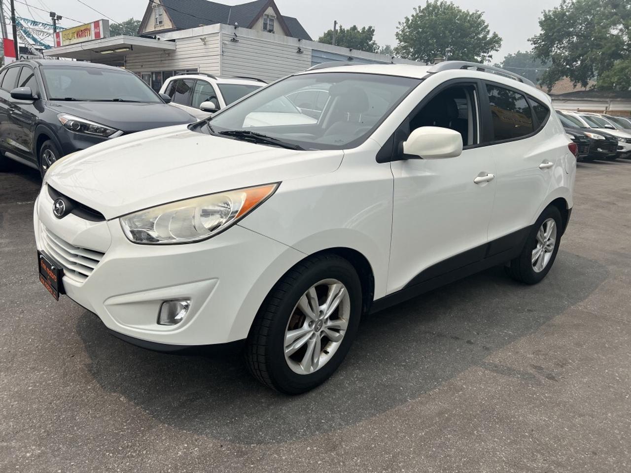 2012 Hyundai Tucson GLS PZEV 4dr SUV (2.4L 4cyl 6A) Photo