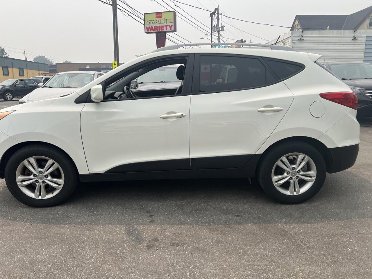 2012 Hyundai Tucson GLS PZEV 4dr SUV (2.4L 4cyl 6A) Photo3