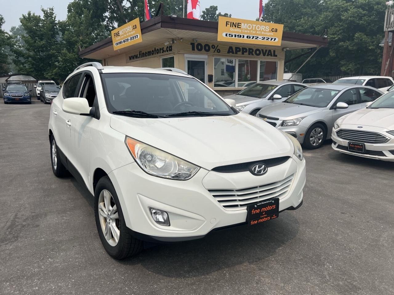 2012 Hyundai Tucson GLS PZEV 4dr SUV (2.4L 4cyl 6A) Photo