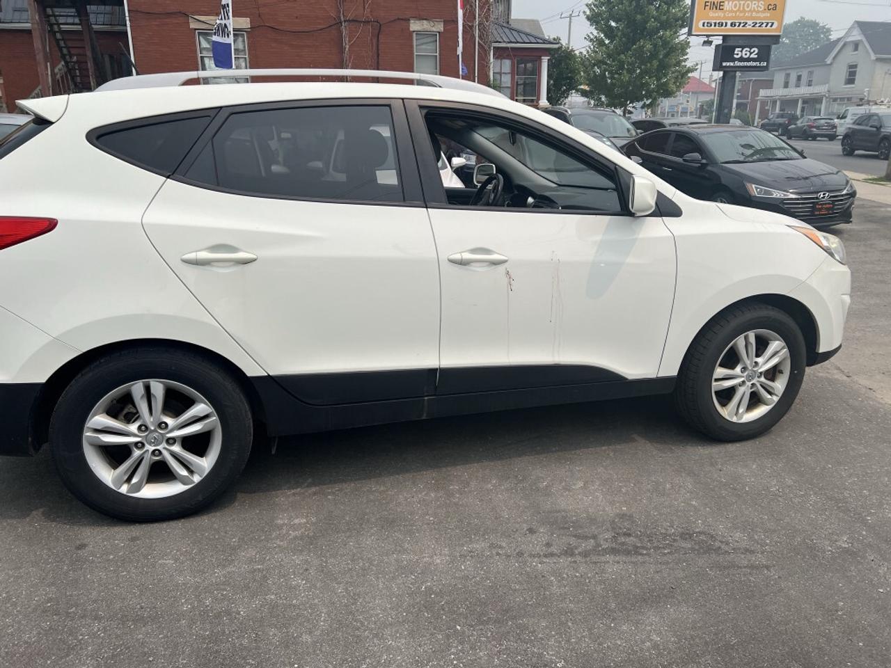 2012 Hyundai Tucson GLS PZEV 4dr SUV (2.4L 4cyl 6A) Photo
