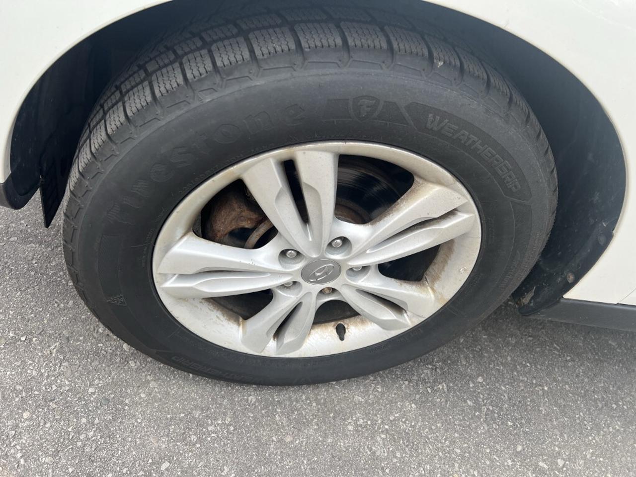 2012 Hyundai Tucson GLS PZEV 4dr SUV (2.4L 4cyl 6A) Photo