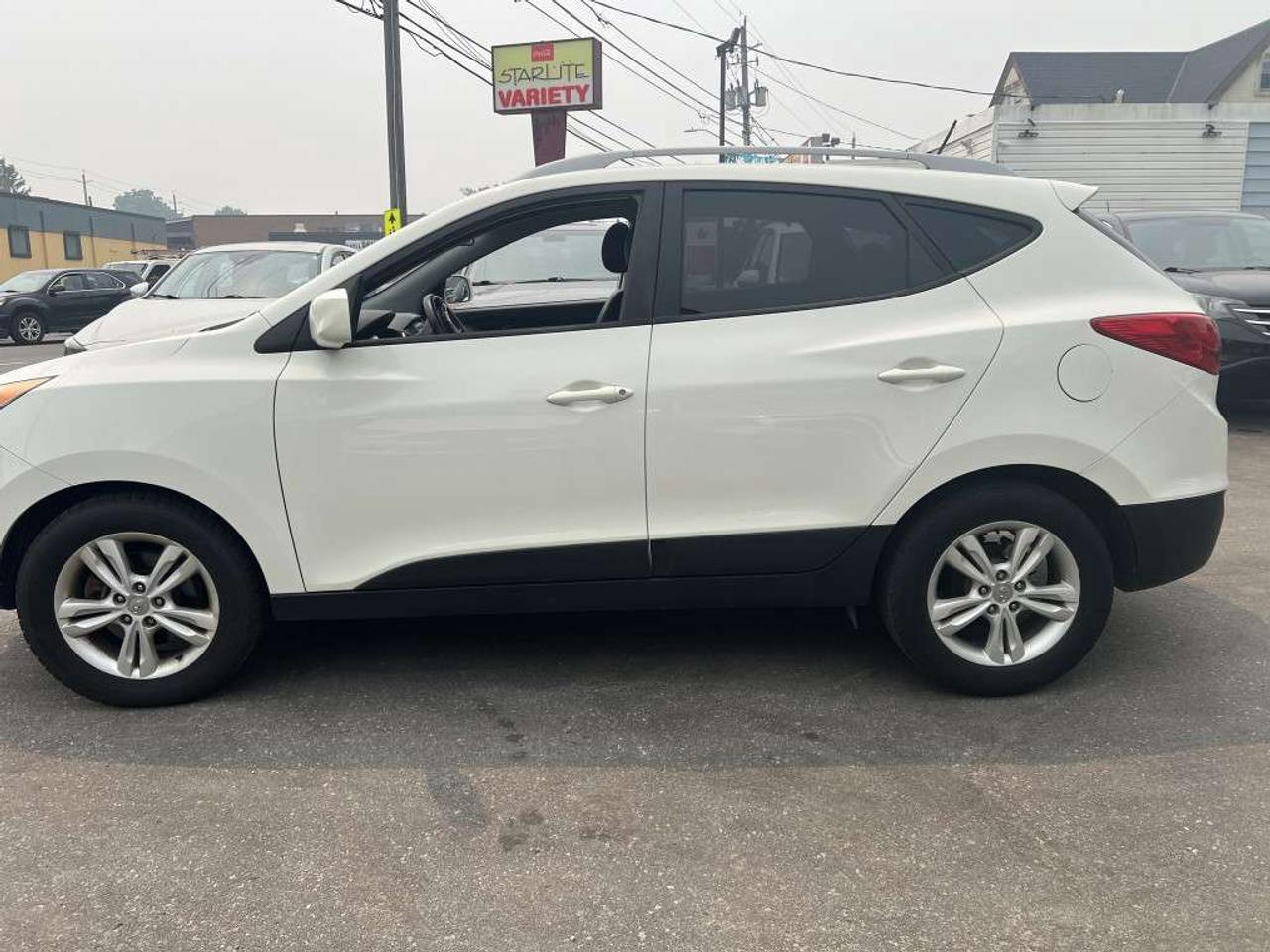 2012 Hyundai Tucson GLS PZEV 4dr SUV (2.4L 4cyl 6A) Photo