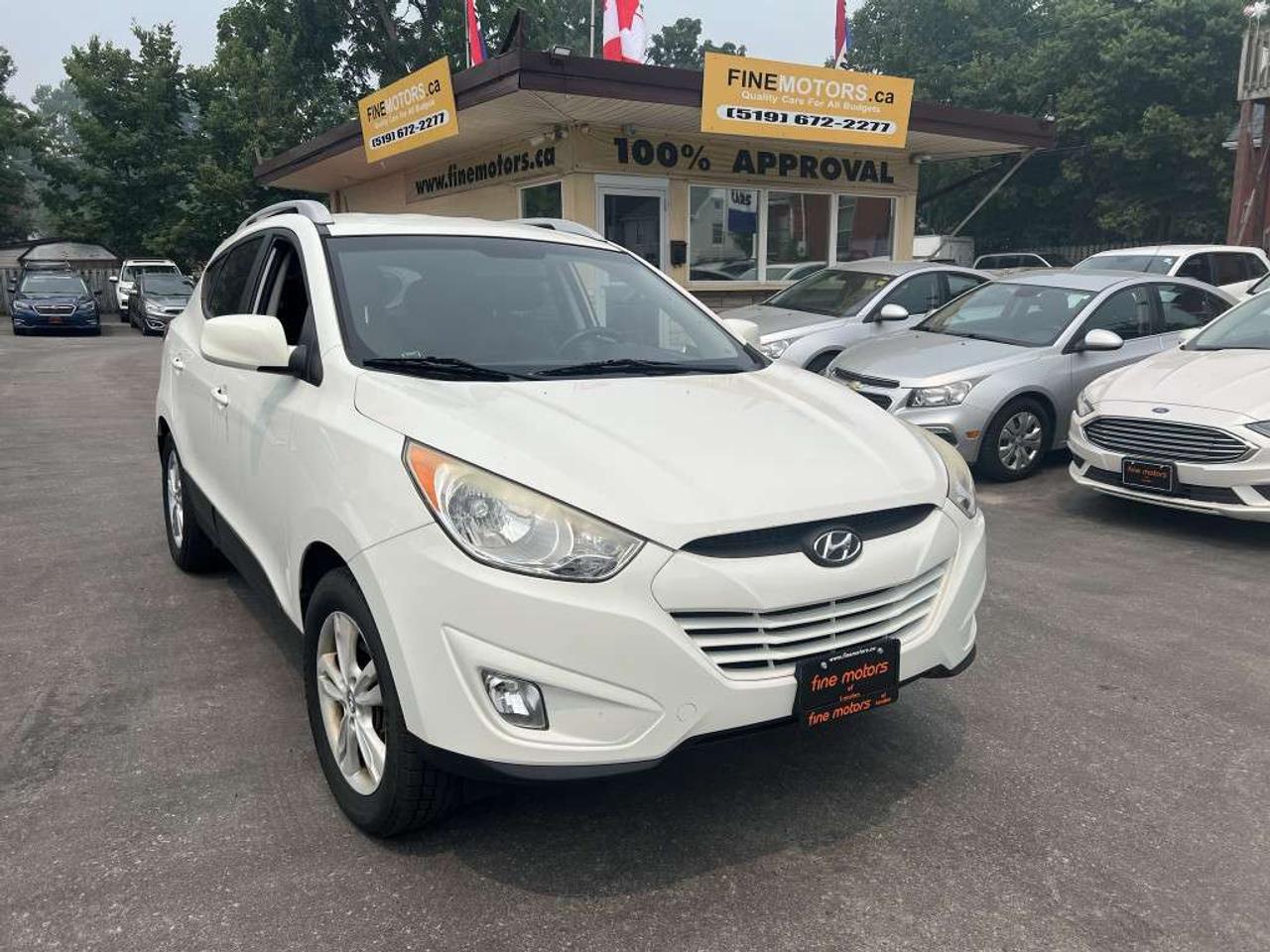 2012 Hyundai Tucson GLS PZEV 4dr SUV (2.4L 4cyl 6A) Photo