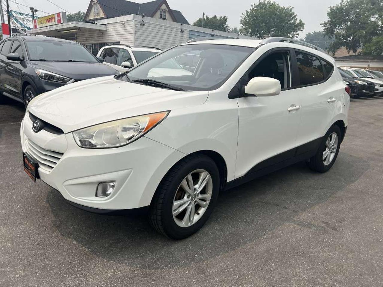 2012 Hyundai Tucson GLS PZEV 4dr SUV (2.4L 4cyl 6A) Photo
