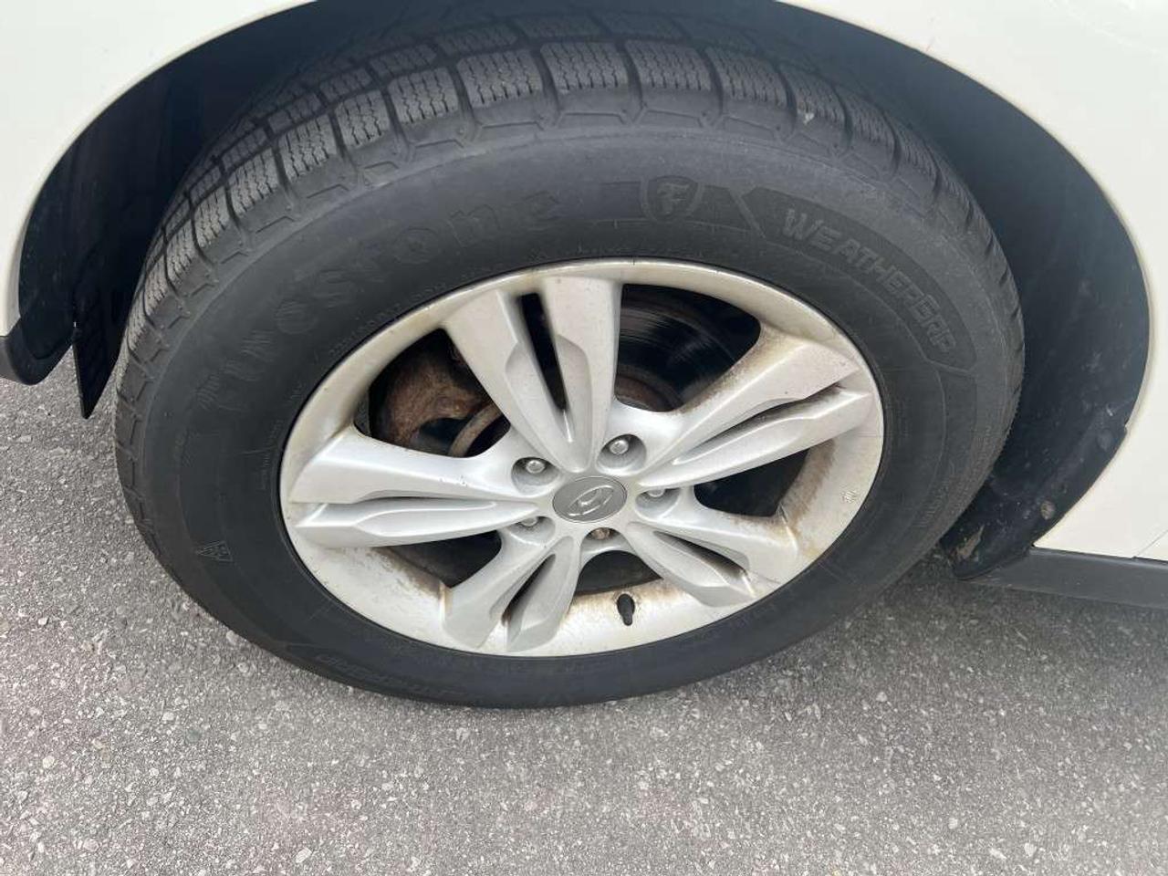 2012 Hyundai Tucson GLS PZEV 4dr SUV (2.4L 4cyl 6A) Photo
