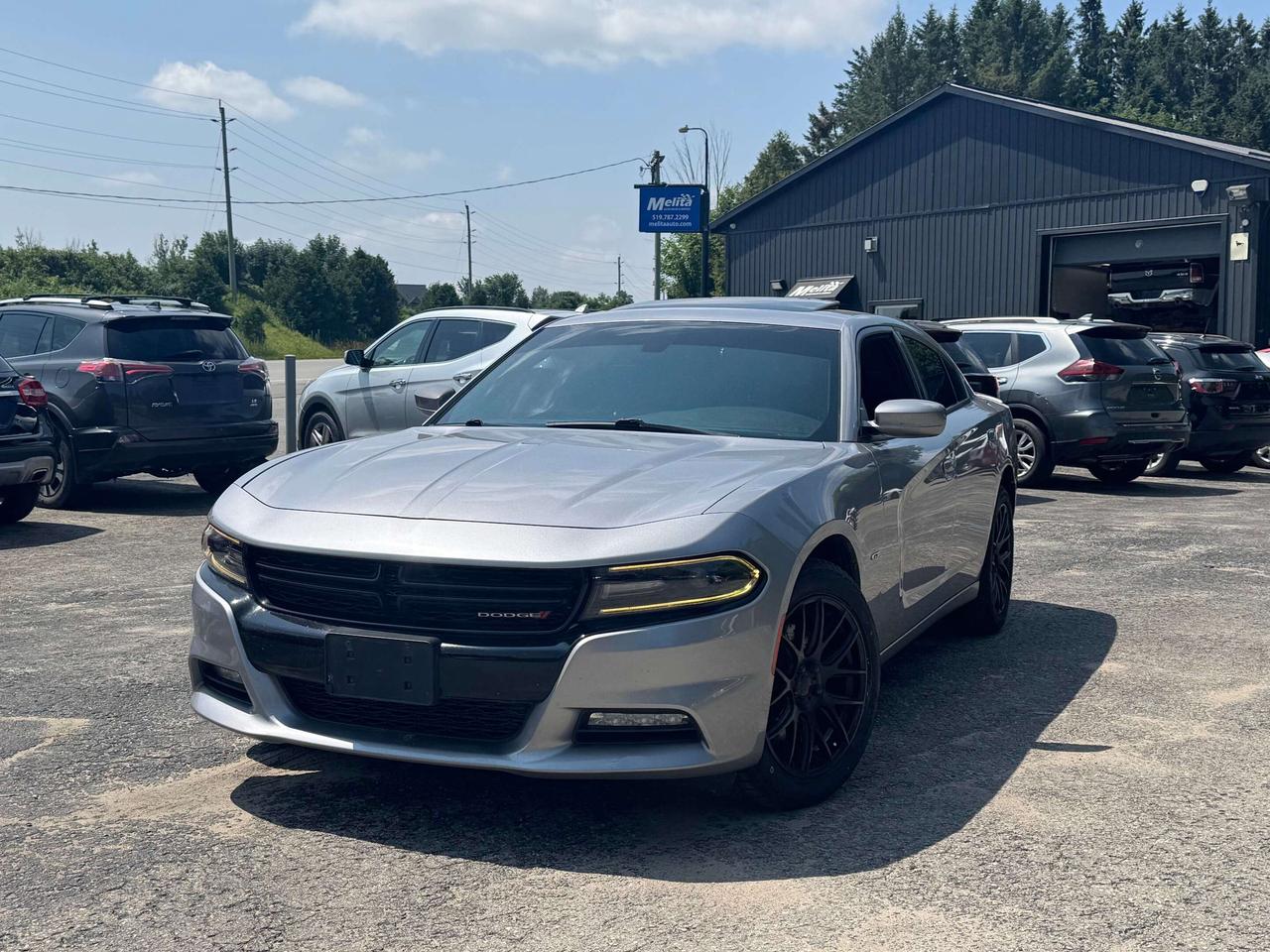 2018 Dodge Charger GT AWD!  Hellcat replica wheels, navigation, parking sensors, heated seats, and much more!  Putting our best foot forward, come join our family at Melita Auto!  We are a family owned dealership for over 29 years in Fergus, providing outstanding customer service through our service centre and certified vehicle sales.  Our success and reputation has been built selling quality pre-owned vehicles that have gone through our reconditioning process which goes well over and above the MTO standards, as well as our auto service that has provided excellent satisfaction locally for over 29 years. We have a substantial number of customers who have bought multiple vehicles from us over the years and refer us to their family, friends, and coworkers as well as customers that have been with us since day 1.  Here at Melita Auto we have Financing Available for all types of credits. Call or email for complete vehicle information. All listings do not include taxes, licensing costs, financing costs, and any extras you wish to add to your vehicle such as warranty, and accessories.  For over 29 years this family owned and operated business has been providing a great selection of quality, gently used vehicles with friendly, small town service, and exceptional value.  Give us a Call Today