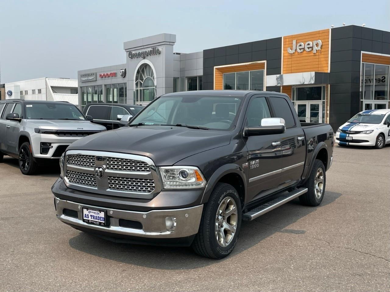 2016 RAM 1500 4WD Crew Cab 140.5  Laramie Photo0