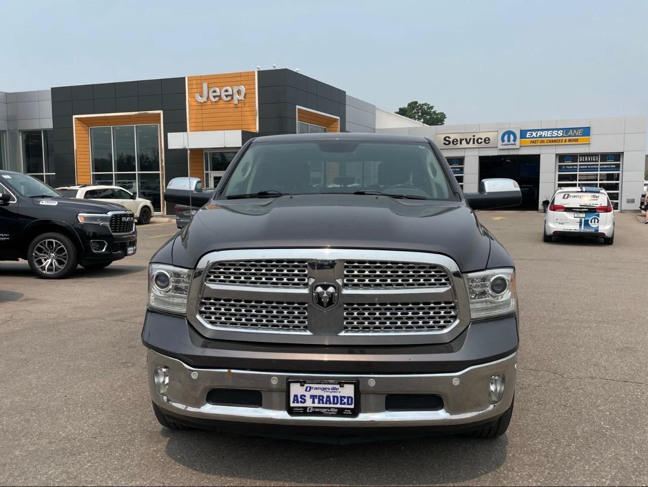 2016 RAM 1500 4WD Crew Cab 140.5  Laramie Photo