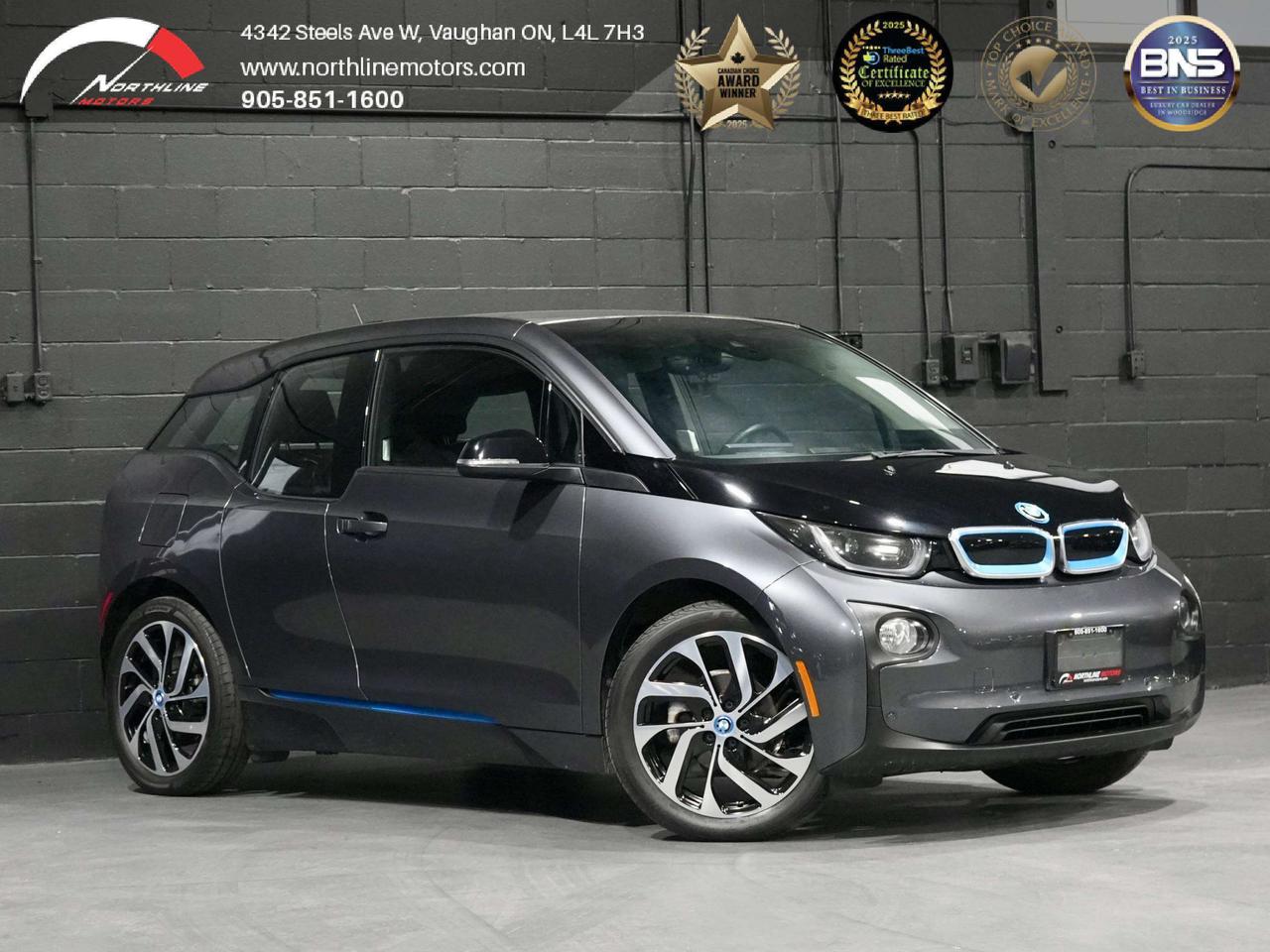 -19-inch BMW i light-alloy wheels
-LED headlights
-LED daytime running lights
-LED taillights
-Heated power-folding exterior mirrors
-Rain-sensing windshield wipers
-Carbon Fiber Reinforced Plastic (CFRP) passenger cell
-Aluminum chassis
-BMW i Blue exterior accents
-Harman/Kardon sound 
-Automatic climate control
-Heated front seats
-Multifunction leather steering wheel
-Split-folding rear seats (50/50)
-Power windows
-Auto-dimming interior mirror
-Center armrest
-Ambient interior lighting
-Start/Stop button
-Keyless Start
-Infotainment
-BMW iDrive system
-Navigation Business
-Bluetooth hands-free
-Bluetooth audio streaming
-USB audio interface
-BMW ConnectedDrive
-BMW Apps compatibility
-Rear-view camera
-Park Distance Control (rear)
-Dynamic Stability Control (DSC)
-Dynamic Traction Control (DTC)
-Anti-lock Braking System (ABS)
-Brake Assist
-Cornering Brake Control
-Tire Pressure Monitoring System (TPMS)
-Hill Start Assist
-Front, side, curtain and knee airbags
-Electric Drive
-33.2 kWh (94 Ah) lithium-ion battery
-170 hp (125 kW) electric motor
-184 lb-ft (250 Nm) torque
-Single-speed automatic transmission
-Rear-wheel drive
-Regenerative braking
-One-pedal driving

QUALIFY FOR A 4-YEAR WARRANTY TODAY!
At Northline Motors, were a family-owned dealership committed to delivering a transparent, stress-free car-buying experience. With over 12 years of industry experience and multiple consumer choice awards, weve built our reputation on quality vehicles, competitive pricing, and exceptional customer service.
Every vehicle comes with:
 Full vehicle history report
 Financing options available
 Extended warranty packages
 Aftermarket protection services
 Ongoing customer support past purchase
Browse our latest inventory online or visit our friendly, no-pressure showroom. Coffee and tea are always on us!
Please note: Prices exclude applicable taxes and licensing fees. All vehicles, unless otherwise specified, can be certified for an additional $999; otherwise, as per OMVIC regulations, the vehicle is not drivable, certified, or e tested.
While every effort is made to ensure accuracy, errors, omissions, and pricing changes may occur.  Please contact our sales team to verify vehicle details including vehicle options and availability.