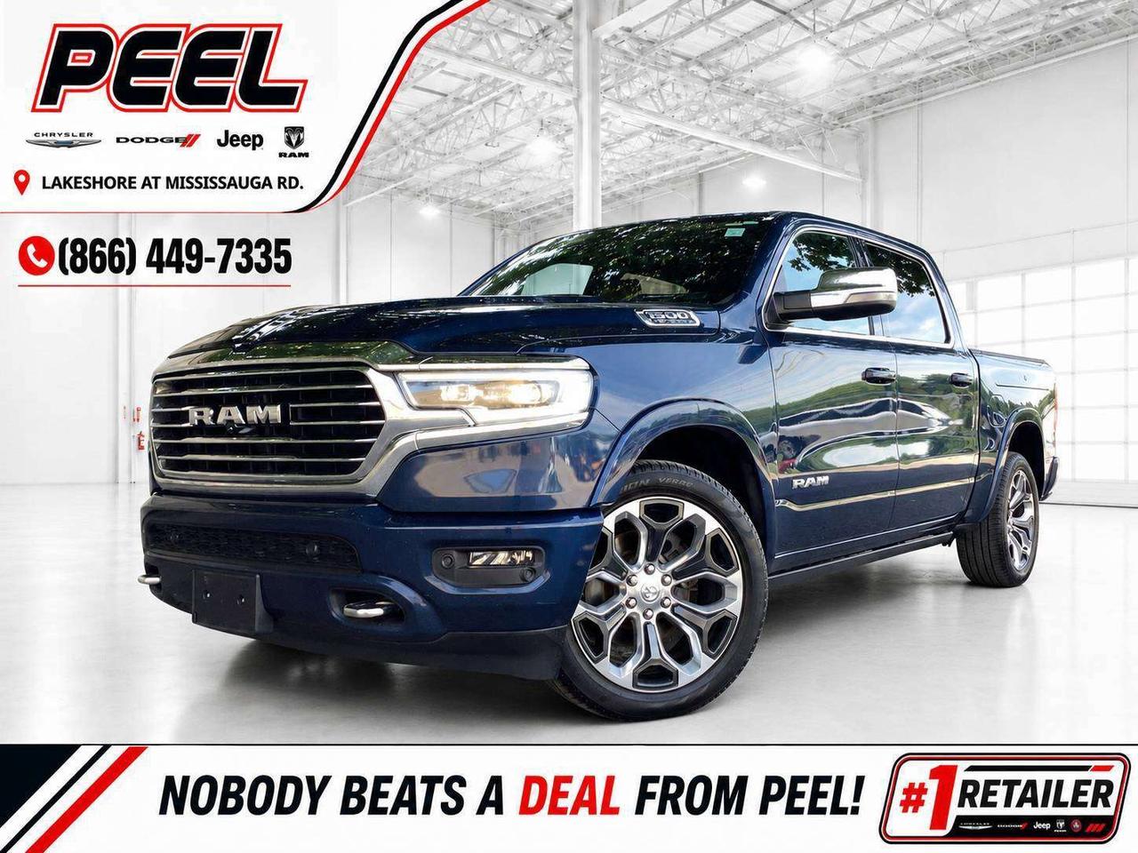 COME SEE WHY NOBODY BEATS A DEAL FROM PEEL! Your Source for ALL make and models used cars and trucks.

2023 Ram 1500 Longhorn Crew Cab 4X4 | 5.7L HEMI V8 w/ eTorque | Patriot Blue Pearl | Heated & Ventilated New Saddle Leather Bucket Seats | Heated & Ventilated Second-row Seats | Uconnect 5 NAV w/ 12" Touchscreen Display | 12" Digital Instrument Cluster | 19-speaker harman/kardon Premium Audio System | Longhorn Level 1 Equipment Group | Dual-Pane Panoramic Sunroof | Head-Up Display | Digital Rearview Mirror | Wireless Smartphone Charging Pad | Wireless Apple CarPlay & Android Auto | Heated Steering Wheel | Remote Start | Power Running Boards | Adaptive Cruise Control w/ Stop & Go | Lane Keep Assist | Forward Collision Warning | Blind Spot Monitoring w/ Rear Cross-Path Detection | Parallel & Perpendicular Park Assist | Body-colour Bumper Group | 22x9 Polished Aluminum Wheels | RamBox Cargo Management System | Multi-function Tailgate | Mopar Spray-in Bedliner | Rear Power Sliding Window | Class IV Hitch Receiver | Trailer Brake Control | E-Locker Rear Axle | 3.92 Rear Axle Ratio

This 2023 Ram 1500 Longhorn comes finished in stunning Patriot Blue Pearl with the classic New Saddle leather interior and is powered by the legendary 5.7L HEMI V8 with eTorque, giving you classic Mopar power, unmistakable Longhorn character, and serious truck capability in one gorgeous package. This is an exceptionally well-equipped and hard-to-find Longhorn, with heated and ventilated leather seating in both rows, a heated steering wheel, power running boards, and a dual-pane panoramic sunroof creating a cabin that feels every bit as special as it looks. Inside the award-winning Ram interior, the massive 12-inch Uconnect 5 touchscreen with navigation, 12-inch digital instrument cluster, 19-speaker Harman/Kardon High Performance Audio System, Head-Up Display, digital rearview mirror, wireless smartphone charging, and wireless Apple CarPlay and Android Auto deliver an impressive level of luxury and technology. What really separates this truck is the rare combination of the RamBox Cargo Management System and Multi-Function Tailgate, giving you secure bedside storage and easier access to the box, two highly desirable factory options that are seldom found together. Add in the Mopar spray-in bedliner, Class IV hitch receiver, trailer brake control, E-Locker rear axle, 3.92 gearing, and Rams proven 4X4 capability, and this Longhorn is every bit as useful as it is luxurious. Finished with Adaptive Cruise Control, Lane Keep Assist, Forward Collision Warning, Blind Spot Monitoring, Parallel & Perpendicular Park Assist, body-colour styling, and 22-inch polished wheels, this is a seriously loaded, rare-spec Longhorn built for someone who genuinely loves their trucks.
______________________________________________________

FREE CarFax included! Click the CarFax link in the listing to view the report.

Our advertised prices are for consumers/end users only and are not intended for dealer, wholesale, exporter, or broker purchases.
______________________________________________________

Peel Chrysler is based in Port Credit, Mississauga, and proudly serves customers across Ontario and Canada, including Toronto, Oakville, North York, Richmond Hill, Ajax, Hamilton, Niagara Falls, Brampton, Scarborough, Vaughan, London, Windsor, Cambridge, Kitchener, Waterloo, Brantford, Sarnia, Pickering, Huntsville, Milton, Woodbridge, Aurora, Newmarket, Orangeville, Georgetown, Markham, North Bay, Sudbury, Barrie, Oshawa, Kingston, Innisfil, and surrounding areas. Browse our selection of used cars, trucks, SUVs, vans, Ram, Jeep, Dodge, Chrysler, FIAT, and all makes and models at peelchrysler.com.
______________________________________________________

Disclaimer: Prices are for consumer/end-user purchases only. Advertised prices are all-in and include all dealer fees and charges, including the $499 loan processing fee where applicable, except HST, Fuel and Licensing, unless otherwise stated. Payments, rates, and terms are subject to approved credit and may change without notice. If a trade-in has an outstanding loan balance and Peel Chrysler is required to facilitate the lien payout, a $349 lien payout fee applies. Most pre-owned vehicles originally come with two keys; however, all Peel Chrysler pre-owned vehicles come standard with one key unless otherwise stated. Vehicle images may be digitally adjusted or enhanced for presentation purposes and may not always reflect the exact appearance of the vehicle. While we make every effort to ensure accuracy, vehicle details, features, options, materials, history, specifications, pricing, availability, and CarFax information should be verified with Peel Chrysler before purchase.