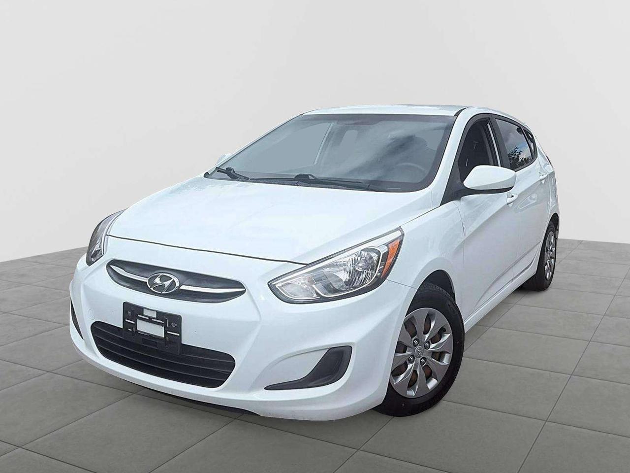 Black Cloth. Manual AC ice cold 

 Century White Hyundai Accent

Vehicle Price and Finance payments include OMVIC Fee, Admin Fee and Fuel. Erin Mills Mitsubishi is proud to offer a superior selection of top quality pre-owned vehicles of all makes. We stock cars, trucks, SUVs, sports cars, and crossovers to fit every budget!! We have been proudly serving the cities and towns of Kitchener, Guelph, Waterloo, Hamilton, Oakville, Toronto, Windsor, London, Niagara Falls, Cambridge, Orillia, Bracebridge, Barrie, Mississauga, Brampton, Simcoe, Burlington, Ottawa, Sarnia, Port Elgin, Kincardine, Listowel, Collingwood, Arthur, Wiarton, Brantford, St. Catharines, Newmarket, Stratford, Peterborough, Kingston, Sudbury, Sault Ste Marie, Welland, Oshawa, Whitby, Cobourg, Belleville, Trenton, Petawawa, North Bay, Huntsville, Gananoque, Brockville, Napanee, Arnprior, Bancroft, Owen Sound, Chatham, St. Thomas, Leamington, Milton, Ajax, Pickering and surrounding areas since 2009.