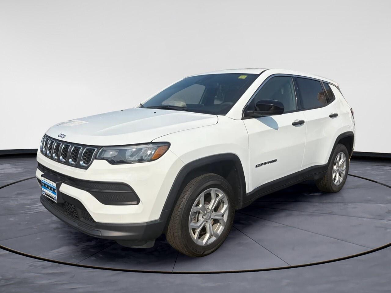 Introducing the 2024 Jeep Compass Sport 4x4 in a captivating shade that complements its rugged 4&times;4 drivetrain. This SUV promises competent handling and a driving experience thats ready for any adventure.

The exterior showcases modern styling with eye-catching alloy wheels that add a touch of distinction on every journey. Step inside to find a thoughtfully designed interior featuring heated seats and mirrors, ensuring comfort on chilly days. The spacious cabin, equipped with power windows, offers a user-friendly experience for all passengers.

On the technology front, the Compass Sport is well-equipped with smart device integration allowing seamless connectivity, along with a reliable backup camera for enhanced safety. The inclusion of lane assist and brake assist ensures peace of mind by providing crucial driver assistance. Cruise control further enhances driving comfort, making those long drives more enjoyable.

This vehicle presents an ideal choice for adventurers and families seeking both capability and practical comfort. Dont miss the chance to explore what this Jeep Compass has to offer. Contact Windsor Chrysler today to learn more about this exceptional SUV and how it can suit your lifestyle.