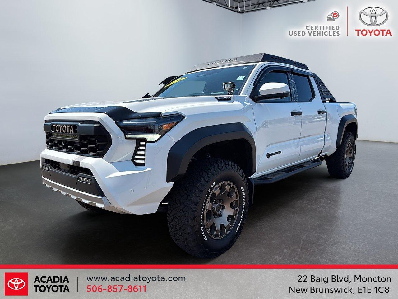 Recent Arrival! Odometer is 9791 kilometers below market average! White 2025 Toyota Tacoma Hybrid 4WD 8-Speed Automatic I4



Sale price includes a $1,500 Finance Credit and is available to customers who finance their vehicle purchase through Acadia Toyota. Contact us for complete details and eligibility requirements.



NEW 2 YEAR MVI INSPECTION DONE HERE AT ACADIA TOYOTA, I4, 9 Speakers, Brake assist, Electronic Stability Control, Heads-Up Display, Navigation System, Power driver seat, Power steering, Power windows.





Drive with confidence in a Toyota Certified Pre-Owned vehicle. Every certified Toyota undergoes a comprehensive 160-point inspection performed by factory-trained technicians to ensure it meets Toyotas high standards for quality, safety, and reliability. With manufacturer-backed benefits and exceptional value, you can enjoy the peace of mind that comes with owning a certified Toyota.