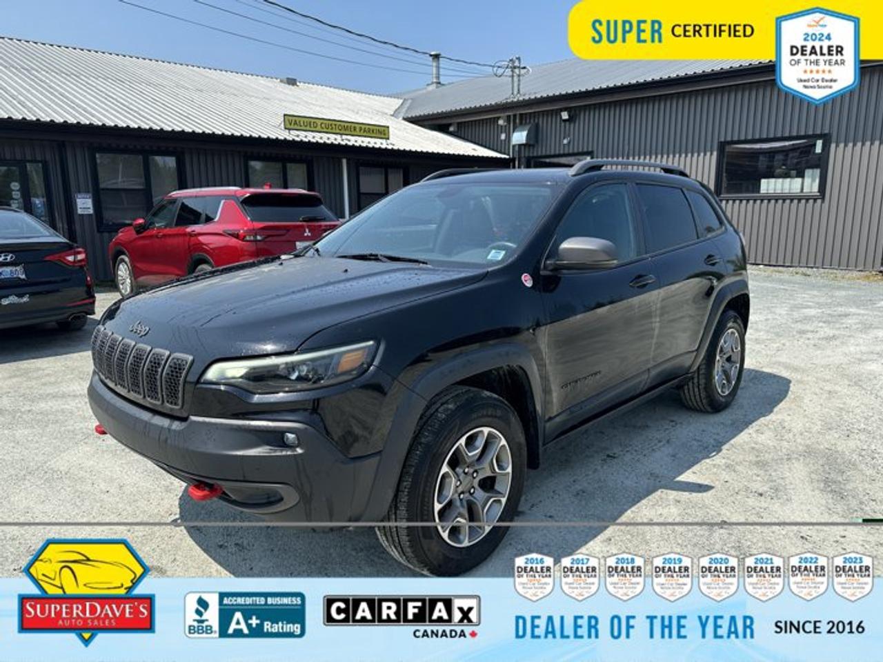Ready for serious adventure? This 2021 Jeep Cherokee Trailhawk is built to tackle trails and commute with confidence. With 4WD and Jeeps Active Drive II paired to a smooth 9-speed automatic and the proven 3.2L Pentastar V6, this Trailhawk delivers capability when you need it and composure on pavement. The Trailhawks all-terrain tires, tow hooks and Trailer Tow Group with Class III hitch make weekend hauls and off-road detours effortless.<br><p>THE SUPER DAVES ADVANTAGE</p> <p>BUY REMOTE - No need to visit the dealership. Through email, text, or a phone call, you can complete the purchase of your next vehicle all without leaving your house!</p> <p>DELIVERED TO YOUR DOOR - Your new car, delivered straight to your door! When buying your car with Super Daves, well arrange a fast and secure delivery. Just pick a time that works for you and well bring you your new wheels!</p> <p>PEACE OF MIND WARRANTY - Every vehicle we sell comes backed with a warranty so you can drive with confidence.</p> <p>EXTENDED COVERAGE - Get added protection on your new car and drive confidently with our selection of competitively priced extended warranties.</p> <p>WE ACCEPT TRADES - We&rsquo;ll accept your trade for top dollar! We&rsquo;ll assess your trade in with a few quick questions and offer a guaranteed value for your ride. We&rsquo;ll even come pick up your trade when we deliver your new car.</p> <p>SUPER CERTIFIED INSPECTION - Every vehicle undergoes an extensive 120 point inspection, that ensure you get a safe, high quality used vehicle every time.</p> <p>FREE CARFAX VEHICLE HISTORY REPORT - If youre buying used, its important to know your cars history. Thats why we provide a free vehicle history report that lists any accidents, prior defects, and other important information that may be useful to you in your decision.</p> <p>METICULOUSLY DETAILED &ndash; Buying used doesn&rsquo;t mean buying grubby. We want your car to shine and sparkle when it arrives to you. Our professional team of detailers will have your new-to-you ride looking new car fresh.</p> <p>(Please note that we make all attempt to verify equipment, trim levels, options, accessories, kilometers and price listed in our ads however we make no guarantees regarding the accuracy of these ads online. Features are populated by VIN decoder from manufacturers original specifications. Some equipment such as wheels and wheels sizes, along with other equipment or features may have changed or may not be present. We do not guarantee a vehicle manual, manuals can be typically found online in the rare event the vehicle does not have one. Please verify all listed information with our dealership in person before purchase. The sale price does not include any ongoing subscription based services such as Satellite Radio. Any software or hardware updates needed to run any of these systems would also be the responsibility of the client. All listed payments are OAC which means On Approved Credit and are estimated without taxes and fees as these may vary from deal to deal, taxes and fees are extra. As these payments are based off our lenders best offering they may be subject to change without notice. Please ensure this vehicle is ready to be viewed at the dealership by making an appointment with our sales staff. We cannot guarantee this vehicle will be on premises and ready for viewing unless and appointment has been made.)</p>