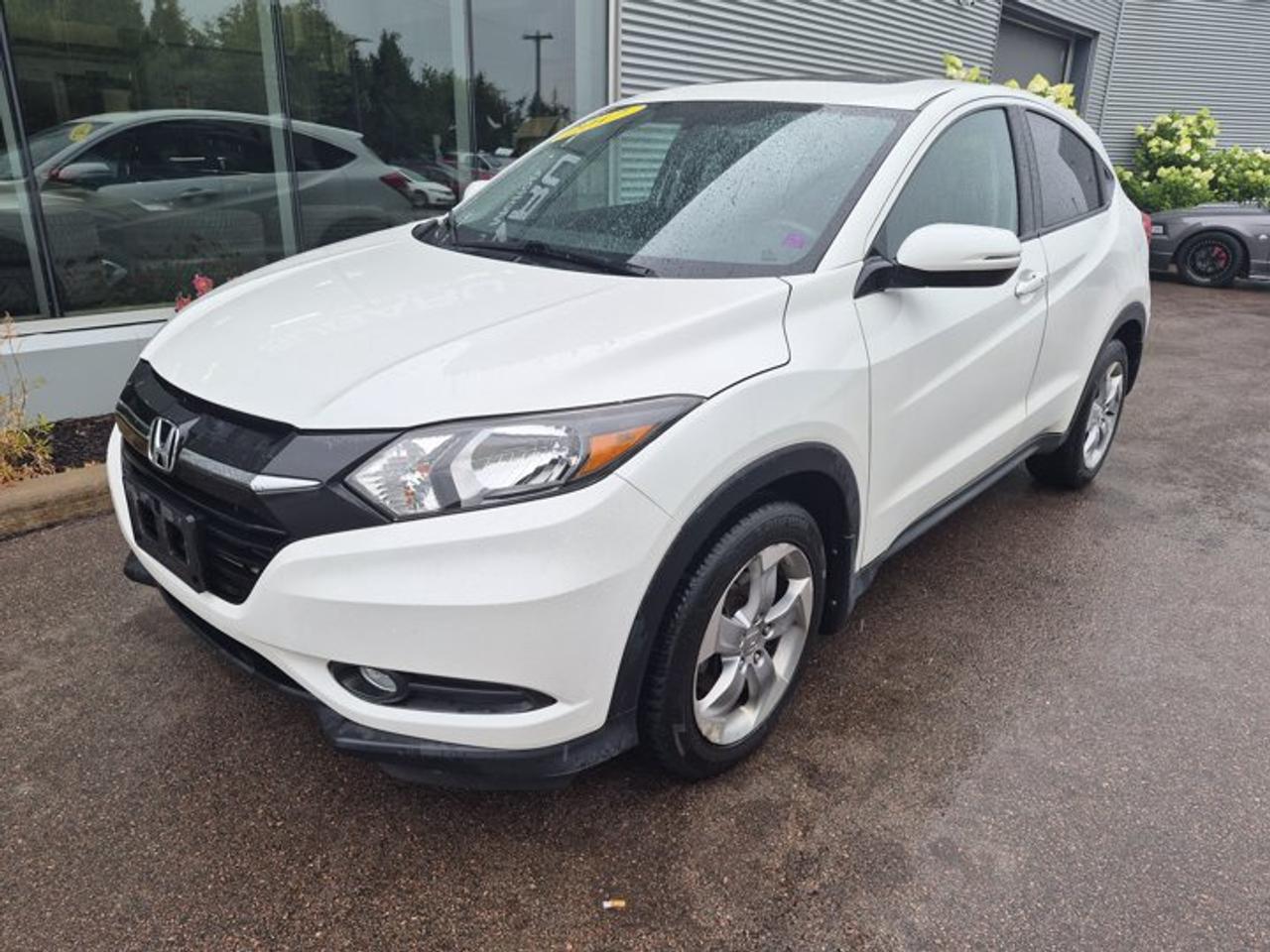 **2017 Honda HR-V EX AWD | Sunroof | Heated Seats | Versatile & Fuel Efficient**Discover the perfect balance of practicality, efficiency, and comfort with this 2017 Honda HR-V EX. Designed for drivers who want the versatility of an SUV with the fuel economy of a compact car, the HR-V is ideal for commuting, weekend getaways, and everything in between.Powered by a fuel-efficient 1.8L i-VTEC® engine, this HR-V delivers a smooth, confident drive while offering the flexibility of Hondas innovative Magic Seat® system, making it easy to accommodate passengers, groceries, or larger cargo with ease.The EX trim adds a host of premium features, including a power moonroof, heated front seats, Honda LaneWatch , a touchscreen infotainment system with Bluetooth® connectivity, a rearview camera, and automatic climate control for enhanced comfort and convenience.Hondas reputation for reliability, excellent resale value, and low ownership costs makes the HR-V a smart choice for drivers looking for a dependable compact SUV.**Key Features:*** 1.8L i-VTEC® 4-cylinder engine* Automatic transmission* Available Real Time AWD with Intelligent Control System* Power moonroof* Heated front seats* Honda LaneWatch blind spot display* Touchscreen infotainment system* Bluetooth® hands-free calling and audio streaming* Rearview camera* Automatic climate control* Push-button start with smart entry* Alloy wheels* Cruise control* Magic Seat® versatile rear seating* Split-folding rear seats* Power windows, locks, and mirrorsCombining outstanding versatility, excellent fuel economy, advanced features, and Hondas legendary dependability, this 2017 Honda HR-V EX is ready for your next adventure. Contact us today to schedule a test drive!
