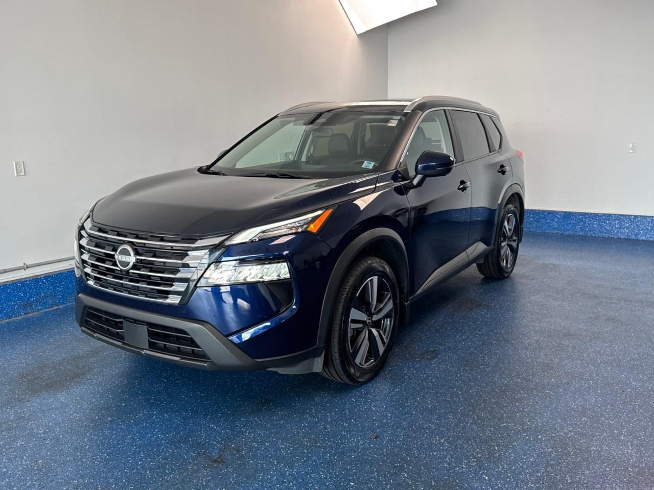 New Price! 2024 Nissan Rogue SV AWD SV Premium | Low Kms | Zacks Certified. CVT with Xtronic AWD Deep Ocean Blue Pearl 1.5L DOHC<br />Odometer is 12334 kilometers below market average!<br /><br />AWD, 19''' Alloy Wheels, 6 Speakers, Air Conditioning, AM/FM radio: SiriusXM, Apple CarPlay/Android Auto, Automatic temperature control, Cloth Seat Trim w/Patterned Inserts, Front Bucket Seats, HD Intelligent Around View Monitor (I-AVM), Heated door mirrors, Heated steering wheel, Leatherette Door Trim Inserts w/Stitch, Navigation System, Package PP00 w/Premium Package (DISC), Power driver seat, Power Liftgate, Power moonroof, Power windows, Prima-Tex Leatherette Seat Trim, Radio: AM/FM NissanConnect, Rear Door Sunshades, Rear Heated Seats, Rear Parking Sensors, Rear window defroster, Remote keyless entry, Spoiler, Telescoping steering wheel, Tilt steering wheel, Turn signal indicator mirrors.<br /><br />Certification Program Details: Fresh 2 Yr MVI | 30 day warranty* | 110 point inspection | Full tank of fuel | Krown rustproofed | Flexible financing options | Professionally detailed<br /><br />This vehicle is Zacks Certified! You're approved! We work with you. Together we'll find a solution that makes sense for your individual situation. Please visit us or call 902 843-3900 to learn about our great selection.<br /><br />With 22 lenders available Zack's Auto Sales can offer our customers with the lowest available interest rate. Thank you for taking the time to check out our selection!