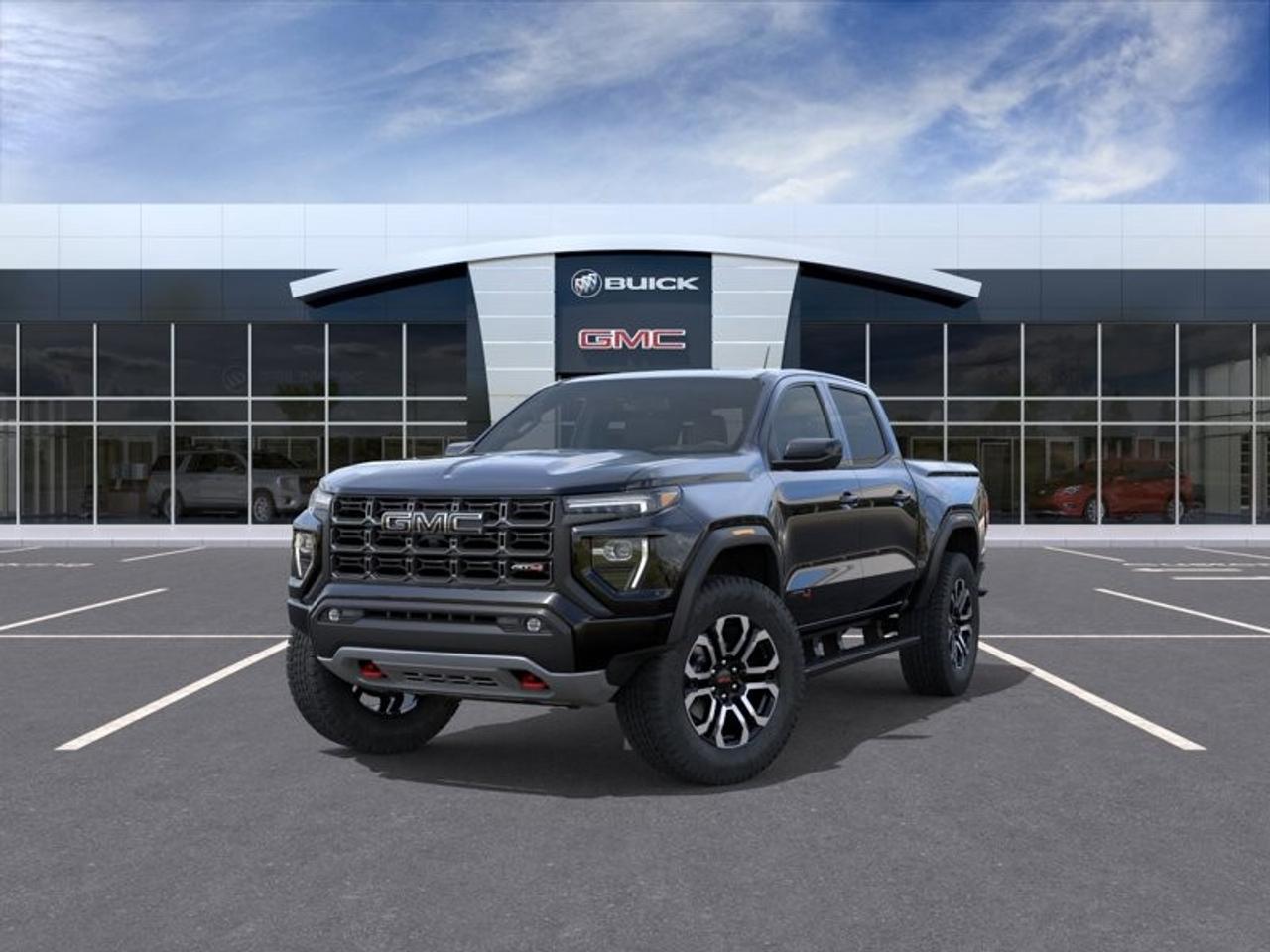 <p>Introducing the stunning 2026 GMC Canyon AT4 in a sleek Onyx Black finish, equipped with a formidable 4×4 drivetrain that promises excellent handling on any terrain. This new Crew Cab Short Box is crafted for adventure and style enthusiasts alike.</p><p>The exterior boasts machine-faced 20-inch aluminum wheels with dark pockets, complemented by aggressive blackwall tires, black assist steps, and striking black GMC emblems, creating a powerful presence on the road. Inside, the attention to detail is equally impressive with Jet Black/Timber perforated leather-appointed front seats, featuring both heating and ventilation for ultimate comfort, and a convenient power sunroof.</p><p>Dive into a technologically advanced cabin with the 11.3-inch diagonal premium GMC infotainment system that includes built-in Google apps, a multi-colour 6.3-inch head-up display, and connectivity options with Android Auto and Apple CarPlay. Safety and driver assistance features are top-notch with Adaptive Cruise Control, HD Surround Vision, rear pedestrian alert, and parking sensors ensuring peace of mind for every journey.</p><p>Perfect for both the off-road enthusiast and the everyday driver seeking luxury and reliability, this GMC Canyon AT4 is a testament to modern engineering and design. Contact Peter Boyer Chevrolet Buick GMC today to schedule a test drive and experience the 2026 Canyon AT4 for yourself.</p>