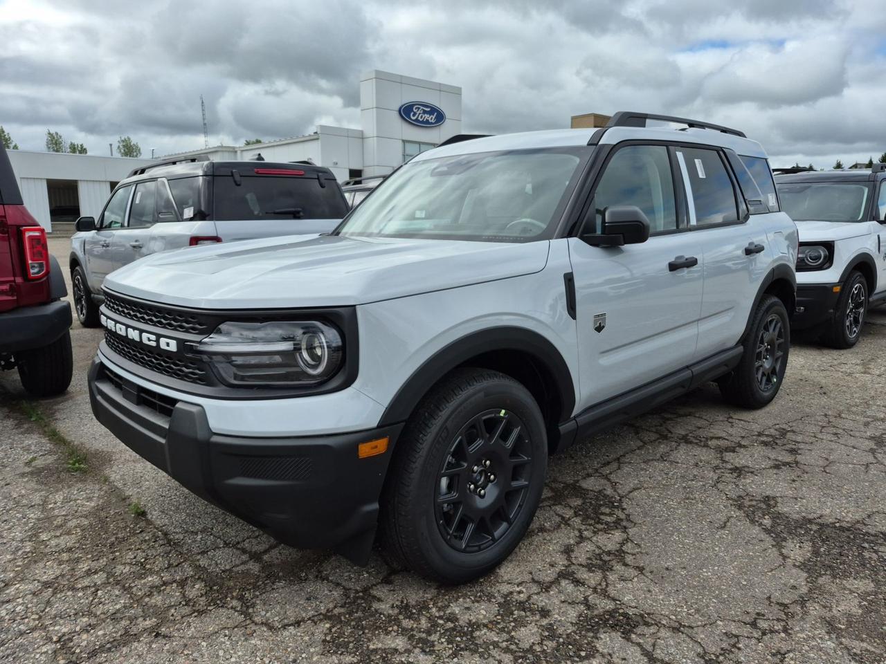 <p>Embark on your next adventure with the all-new 2026 Ford Bronco Sport Big Bend, a versatile SUV designed to conquer both city streets and rugged trails. This stylish rig, showcased at Expressway Motors Ltd., boasts a captivating Space White Metallic exterior, perfectly complemented by a refined Medium LT Smoked Truffle cloth interior. Inside, youll find a spacious cabin outfitted with comfortable, heated front bucket seats, ensuring you&rsquo;re cozy no matter the destination or the weather.</p><p>Beneath its bold exterior lies a capable 1.5L 3-cylinder engine paired with an automatic transmission and legendary 4-wheel drive, ready to tackle diverse Canadian landscapes with confidence. Whether youre navigating snowy highways or exploring a hidden gem off the beaten path, the Bronco Sport Big Bend offers the performance and agility you need. This new Ford Bronco Sport is more than just a vehicle; its your invitation to explore, to discover, and to experience the freedom of the open road.</p><p>Here are 5 features that add serious sizzle to this 2026 Ford Bronco Sport Big Bend:</p><ul><li><strong>Remote Start:</strong> Imagine stepping into a perfectly warmed or cooled vehicle before you even touch the door. Start your engine from the comfort of your home or office and be ready to go the moment you are.</li><li><strong>Adaptive Cruise Control:</strong> Take the stress out of long drives. This intelligent system automatically adjusts your speed to maintain a safe distance from the vehicle ahead, offering a more relaxed and safer driving experience.</li><li><strong>SYNC 4 Infotainment System:</strong> Stay connected and entertained seamlessly with Fords advanced SYNC 4. Enjoy intuitive voice commands, a responsive touchscreen, and effortless smartphone integration for navigation, music, and calls.</li><li><strong>4-Wheel Drive Capability:</strong> Built for adventure, the robust 4-wheel drive system provides exceptional traction and control, allowing you to confidently navigate challenging terrain, from slippery roads to off-road excursions.</li><li><strong>Heated Front Bucket Seats:</strong> No more chilly mornings! These luxurious heated seats offer instant warmth and comfort, ensuring a pleasant drive even on the coldest Canadian days.</li></ul><p><strong><em>Powered by AutoIntelligence&trade;</em></strong></p><p>Vehicle information has been generated using artificial intelligence and is provided for informational purposes only. While efforts are made to ensure accuracy, please confirm all details directly with the dealer.</p><p class=MsoNormal style=margin: 0cm 0cm 8pt; line-height: 13.8pt; font-size: 12pt; font-family: Aptos, sans-serif;><strong><span style=font-family: Calibri, sans-serif;>2 locations to better serve YOU! &ndash; Stratford and New Hamburg</span></strong></p><p>&nbsp;</p><p class=MsoNormal style=margin: 0cm 0cm 8pt; line-height: 13.8pt; font-size: 12pt; font-family: Aptos, sans-serif;><strong><span style=font-family: Calibri, sans-serif;>New or Pre-Owned vehicles are shared between both locations &ndash; please contact Sales to confirm.</span></strong></p><p>&nbsp;</p><p class=MsoNormal style=margin: 0cm 0cm 8pt; line-height: 13.8pt; font-size: 12pt; font-family: Aptos, sans-serif;><span style=font-family: Calibri, sans-serif;>Purchasing a new vehicle from&nbsp;<strong>Expressway&nbsp;</strong>is a decision that you will be able to make with confidence knowing that you&rsquo;re getting the most that a vehicle and dealership can offer to you.</span></p><p>&nbsp;</p><p class=MsoNormal style=margin: 0cm 0cm 8pt; line-height: 13.8pt; font-size: 12pt; font-family: Aptos, sans-serif;><strong><span style=font-family: Calibri, sans-serif;>Warranty:</span></strong><span style=font-family: Calibri, sans-serif;>&nbsp;We offer best in class Extended Protection options with flexible terms that can be tailored to your needs at a price that you can afford.</span></p><p>&nbsp;</p><p class=MsoNormal style=margin: 0cm 0cm 8pt; line-height: 13.8pt; font-size: 12pt; font-family: Aptos, sans-serif;><strong><span style=font-family: Calibri, sans-serif;>Finance:</span></strong><span style=font-family: Calibri, sans-serif;>&nbsp;At Expressway we have some of the best Finance Managers in the business that work with all the Major banks and Core Lenders. The Relationships we have built will help guarantee that you get the lowest rate possible</span></p><p>&nbsp;</p><p class=MsoNormal style=margin: 0cm 0cm 8pt; line-height: 13.8pt; font-size: 12pt; font-family: Aptos, sans-serif;><span style=font-family: Calibri, sans-serif;>Check out our great selection of vehicles at Expressway in New Hamburg and Stratford Locations!</span></p><p>&nbsp;</p><p class=MsoNormal style=margin: 0cm 0cm 8pt; line-height: 13.8pt; font-size: 12pt; font-family: Aptos, sans-serif;><strong><span style=font-family: Calibri, sans-serif;>Call Expressway for your quote today!</span></strong></p><p>&nbsp;</p><p class=MsoNormal style=margin: 0cm 0cm 8pt; line-height: 13.8pt; font-size: 12pt; font-family: Aptos, sans-serif;><strong><span style=font-family: Calibri, sans-serif;>New Hamburg:</span></strong><span style=font-family: Calibri, sans-serif;>&nbsp;<a href=tel:+15196623900><span style=color: #0563c1;>519*662*3900</span></a></span></p><p>&nbsp;</p><p class=MsoNormal style=margin: 0cm 0cm 8pt; line-height: 13.8pt; font-size: 12pt; font-family: Aptos, sans-serif;><strong><span style=font-family: Calibri, sans-serif;>Stratford</span></strong><span style=font-family: Calibri, sans-serif;>:&nbsp;<a href=tel:+15192713900><span style=color: #0563c1;>519*271*3900</span></a></span></p><p>&nbsp;</p><p class=MsoNormal style=margin: 0cm 0cm 8pt; line-height: 13.8pt; font-size: 12pt; font-family: Aptos, sans-serif;><span style=font-family: Calibri, sans-serif;>or visit us online at:&nbsp;&nbsp;<a href=https://www.expresswayford.com/ target=_blank rel=noopener><span style=color: #0563c1;>www. expresswayford .com</span></a>&nbsp;or&nbsp;<a href=https://www.expresswaylincoln.ca/ target=_blank rel=noopener><span style=color: #0563c1;>www. expresswaylincoln .ca</span></a></span></p><p>&nbsp;</p><p class=MsoNormal style=margin: 0cm 0cm 8pt; line-height: 13.8pt; font-size: 12pt; font-family: Aptos, sans-serif;><strong><span style=font-family: Calibri, sans-serif;>We pride ourselves in No Hassle, No Pressure, Honest Service. We practice full disclosure with all our used vehicles and have a Better Business Bureau A+ rating!</span></strong></p><p>&nbsp;</p><p class=MsoNormal style=margin: 0cm 0cm 8pt; line-height: 13.8pt; font-size: 12pt; font-family: Aptos, sans-serif;><span style=font-size: 8pt; font-family: Calibri, sans-serif;>**Expressway reserves the right to correct any errors and omissions that occur on this site. (Incl, but not limited to price, incl. Event price rollbacks, vehicles features & more).</span></p><p>&nbsp;</p><p class=MsoNormal style=margin: 0cm 0cm 8pt; line-height: 13.8pt; font-size: 12pt; font-family: Aptos, sans-serif;><span style=font-size: 8pt; font-family: Calibri, sans-serif;>** Expressway is a Fair Market Price Dealership pricing subject to change with current market conditions</span></p>