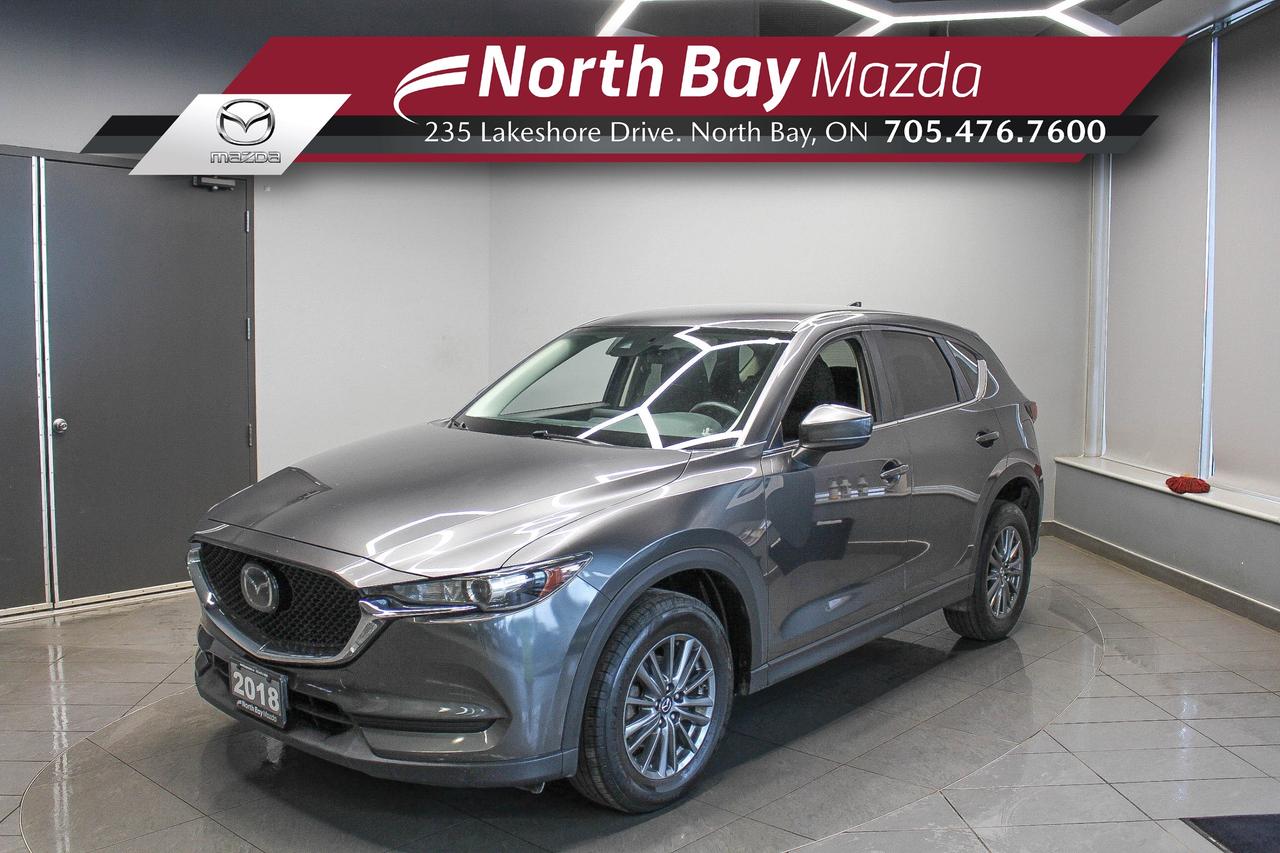 The 2018 Mazda CX-5 GX is a practical SUV that delivers the responsive driving experience and refined feel Mazda is known for. Its comfortable cabin, smooth ride, and versatile interior make it a great fit for everything from the daily commute to weekend plans. With plenty of cargo space and a thoughtfully designed interior, its an SUV thats easy to enjoy every day. Reliable, comfortable, and well-balanced, the CX-5 GX is ready for whatever comes next. FEATURES: Cloth seating, backup camera, Bluetooth connectivity, Mazda Connect infotainment system, steering wheel audio controls, radar cruise control, air conditioning, push-button start, keyless entry, USB connectivity, Clean Carfax!

Why Youll Want to Buy from North Bay Mazda? *The Clubhouse Commitment Pre-Owned Vehicle Program provides you with additional coverage for things such as the 3-year Tire and Rim Coverage, The Clubhouse Powertrain Warranty, coverage for The Little Things like battery, wiper, and bulb replacement, 3- year anti-theft protection to give you the ultimate peace of mind when purchasing a pre-owned vehicle. Clubhouse Commitment is an optional coverage which 
can be purchased at time of sale for a $699 value. Pre-Owned Vehicle purchases are subject to 
an adjusted price when purchasing with cash. You are eligible for Finance Pricing with a maximum down payment of 15% of listed finance price. Contact us for more details. * Our certified vehicles go through a 120-point Clubhouse Certified Used Vehicle Inspection, and we will provide the CarFax vehicle history documents as well as any available service history. * We competitively price our vehicles below the market average which means that we have already done all the market research for you. Rest assured that you are getting the best deal possible. * We have automotive financial experts who are experienced in dealing with all levels of credit challenges. We also work with all major banks and third-party lenders daily so we are confident that we can get you the best rate available. * As a premier New and Pre-Owned vehicle 
dealership, we pride ourselves on a superior customer experience and a lifetime of customer care. We are conveniently located at 235 Lakeshore Drive, in North Bay, Ontario. If you cant make it to us, we can accommodate you! Call us today at 705-476-7600 to come in and see this vehicle!