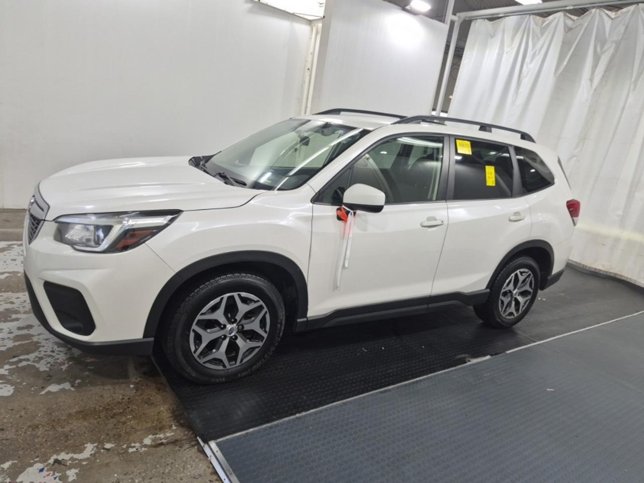 ** ** SPECIAL LIMITED TIME OFFER ** ** PURCHASE ANY VEHICLE THIS WEEK AND RECEIVE 4 BRAND-NEW ALL-SEASON TIRES AT NO ADDITIONAL COST!!! DON   T MISS THIS EXCLUSIVE CHANCE TO UPGRADE YOUR RIDE AND STAY PREPARED FOR ANY WEATHER!!! <br><br>EXCITING NEWS FROM FIRST CHOICE MOTORS! Our brand-new online showroom is now open to the public, bringing the ultimate car shopping experience right to your fingertips! Enjoy a 100% online car shopping experience, with over 500 certified vehicles in stock, comprehensive protection plans, and thousands of new auto parts & accessories available! Plus, for a limited time, were offering FREE deliveries across Ontario on all vehicle purchases! Dont miss out   visit Shop.fcmotors.ca to find and upgrade your perfect vehicle today!<br><br>Welcome to First Choice Motors, the largest car dealership in Toronto of pre-owned cars, SUVs, and vans priced between $5000-$15,000. With an impressive inventory of over 300 vehicles in stock, we are dedicated to providing our customers with a vast selection of affordable and reliable options. <br><br>Were thrilled to offer a used 2020 Subaru Forester CONVENIENCE, white color with 196,000km (STK#10123) This vehicle was $13990 NOW ON SALE FOR $12990. It is equipped with the following features:<br>- Automatic Transmission<br>- Heated seats<br>- All wheel drive<br>- Bluetooth<br>- Reverse camera<br>- Alloy wheels<br>- Power windows<br>- Power locks<br>- Power mirrors<br>- Air Conditioning<br><br>At First Choice Motors, we believe in providing quality vehicles that our customers can depend on. All our vehicles come with a 36-day guarantee on all safety related items. We also offer additional warranty options up to 5 years for our customers who want extra peace of mind.<br><br>Furthermore, all our vehicles are sold fully certified with brand new brakes rotors and pads, a fresh oil change, and brand new set of all-season tires installed & balanced. You can be confident that this car is in excellent condition and ready to hit the road.<br><br>At First Choice Motors, we believe that everyone deserves a chance to own a reliable and affordable vehicle. Thats why we offer financing options with low interest rates starting at 7.9% O.A.C. Were proud to approve all customers, including those with bad credit, no credit, students, and even 9 socials. Our finance team is dedicated to finding the best financing option for you and making the car buying process as smooth and stress-free as possible.<br><br>Our dealership is open 7 days a week to provide you with the best customer service possible. We carry the largest selection of used vehicles for sale under $9990 in all of Ontario. We stock over 300 cars, mostly Hyundai, Chevrolet, Mazda, Honda, Volkswagen, Toyota, Ford, Dodge, Kia, Mitsubishi, Acura, Lexus, and more. With our ongoing sale, you can find your dream car at a price you can afford. Come visit us today and experience why we are the best choice for your next used car purchase!<br><br>All prices include $22.00 OMVIC Fee.  Excludes, license plates, ownership registration and ONTARIO HST (13%)<br>*No Credit Card payments can be accepted for Vehicle Purchases*
