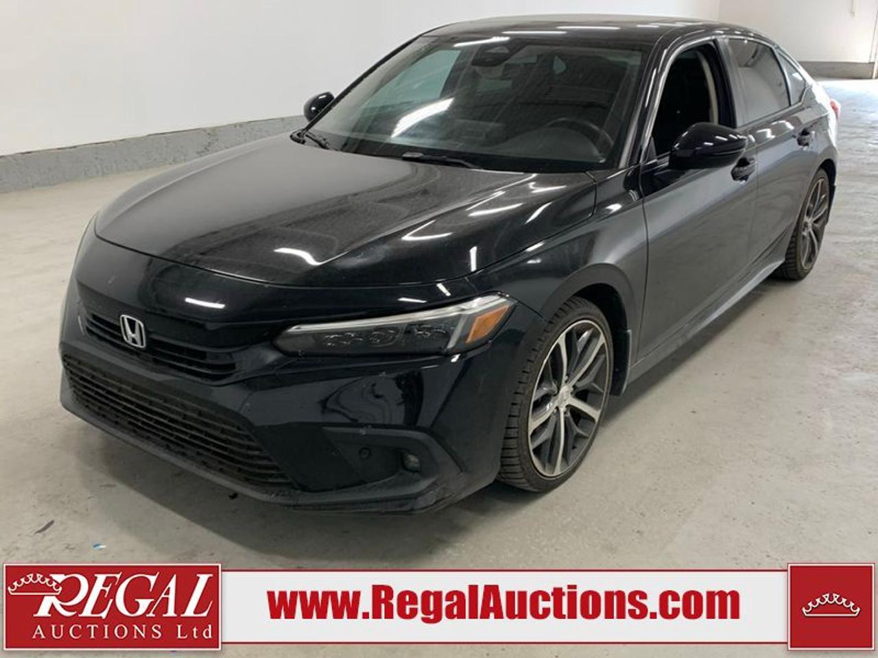 OFFERS WILL NOT BE ACCEPTED BY EMAIL OR PHONE - THIS VEHICLE WILL GO ON TIMED ONLINE AUCTION on Tuesday July 28.<br><br/>VEHICLE DESCRIPTION <br/>Stock #: 44630 <br/>Lot #: 948 <br/>Reserve Price: $21,950 <br/>CarProof Report: Available at www.RegalAuctions.com <br/><br/>IMPORTANT DECLARATION <br/>Claim History: Claim History. <br/>Rebuilt Status: This vehicle has been rebuilt from salvage. <br/> Live Online Bidding: This vehicle will be available for bidding over the internet, visit www.RegalAuctions.com to register. <br/> <br/>The simple solution to selling your car or truck. Bring your clean vehicle in with your Drivers License and current Registration and well put it on the auction block at our next sale.<br/><br/>www.RegalAuctions.com