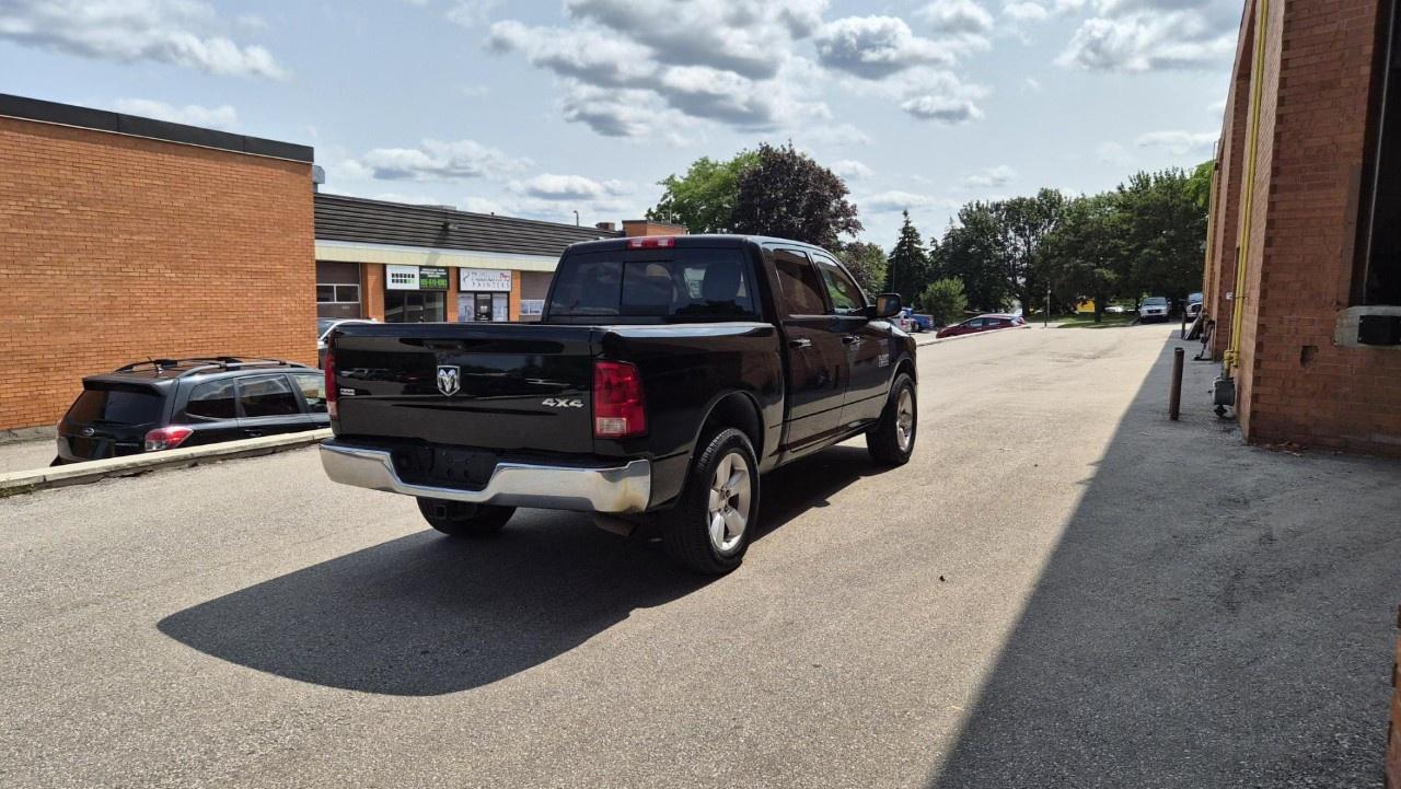 2013 RAM 1500 4WD Crew Cab 5.7 Ft Box SLT Photo4