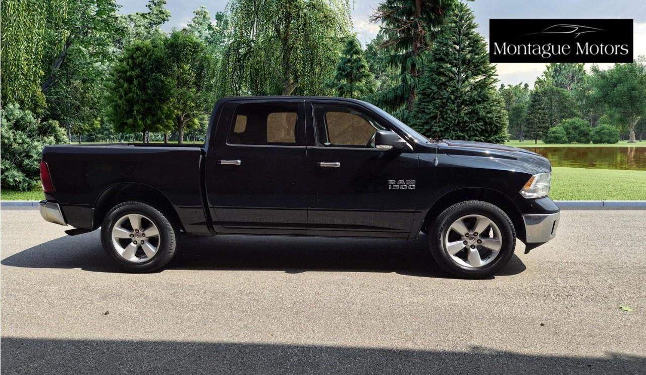 2013 RAM 1500 4WD Crew Cab 5.7 Ft Box SLT Photo3