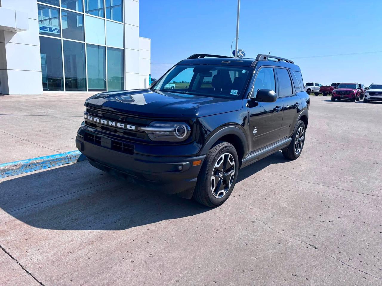 <p>Embark on your next adventure with this stunning, pre-loved 2024 Ford Bronco Sport Outer Banks 4x4, now available at Webbs 1441. Dressed in a sleek Shadow Black exterior, this capable SUV is ready to conquer any terrain Canada throws its way. Its robust 1.5L EcoBoost engine, paired with an 8-speed automatic transmission and 4-wheel drive, ensures a powerful and responsive ride, whether youre navigating city streets or venturing off the beaten path. With only 55,605 kilometers on the odometer, this Bronco Sport is just getting started and is eager to be your trusted companion for years to come.</p><p>&nbsp;</p><p>Step inside the meticulously maintained cabin and experience the premium comfort of the Ebony/Brown, premium-trimmed heated sport contour bucket seats. This Outer Banks model comes loaded with the Tech Package and Equipment Group 300A, offering a suite of advanced features designed to enhance your driving experience. From the convenience of the Class II Trailer Tow Package with trailer sway control, perfect for hauling your gear, to the peace of mind provided by Ford Co-Pilot360 Assist+, this Bronco Sport is as intelligent as it is rugged.</p><p>&nbsp;</p><p>Here are five features that truly make this 2024 Ford Bronco Sport Outer Banks 4x4 shine:</p><p><br><br></p><ul><li><strong>Ford Co-Pilot360 Assist+:</strong> Experience advanced driver-assist technologies that provide an extra layer of safety and convenience, making every drive more confident and relaxed.</li></ul><p>&nbsp;</p><ul><li><strong>Heated Premium-Trimmed Sport Contour Bucket Seats:</strong> Sink into luxurious comfort with heated seats that offer exceptional support and a premium feel, perfect for those chilly Canadian mornings.</li></ul><p>&nbsp;</p><ul><li><strong>Class II Trailer Tow Package with Trailer Sway Control:</strong> Ready for your next getaway? This package equips your Bronco Sport to confidently tow your toys, with advanced sway control for added stability.</li></ul><p>&nbsp;</p><ul><li><strong>1.5L EcoBoost Engine:</strong> Enjoy a dynamic blend of power and efficiency from this turbocharged engine, delivering exhilarating performance without compromising on fuel economy.</li></ul><p>&nbsp;</p><ul><li><strong>4-Wheel Drive Capability:</strong> Conquer any road condition with the confidence of true 4x4 performance, designed to tackle diverse Canadian landscapes with ease.</li></ul><p><br><br></p><p><strong><em>Powered by AutoIntelligence&trade;</em></strong></p><p>&nbsp;</p><p>Powered by AutoIntelligence&trade;</p><p>&nbsp;</p>