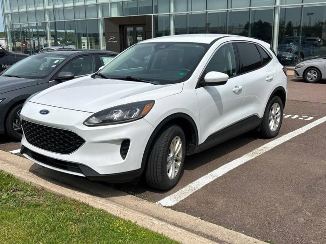 Come see this certified 2020 Ford Escape SE AWD | Heated Seats | Navi | Adaptive Cruise | CarPlay | Blind Spot | Rear Cam | Power Seat & More. Its Automatic transmission and 1.5 L engine will keep you going. This Ford Escape has the following options: Reverse Camera, Navigation System, Apple Car Play, Air Conditioning, Adaptive Cruise, Heated Seats, Tilt Steering Wheel, Steering Radio Controls, Power Windows, and Power Locks. Stop by and visit us at Mark Wilsons Better Used Cars, 5055 Whitelaw Road, Guelph, ON N1H 6J4.MASSIVE SELECTION: 500+ vehicles in ONE LOCATION, all Live Market Priced for the best value!STRAIGHTFORWARD & TRANSPARENT PRICING: Our Advertised Price INCLUDES:Safety Certification! (No separate certification fee upcharge).FREE Carfax History Report!NO upcharge for paying cash!CONFIDENCE & PEACE OF MIND: 30-Day/3,000 km Warranty INCLUDED! Plus a 5-Day Exchange Privilege!*EASY FINANCING: Better-than-bank rates, $0 Down, and 3 Months No Payments available OAC. BAD CREDIT APPROVED HERE!WE BUY CARS: Get Top Dollar for your trade, or sell us your vehicle for CASH even if you dont buy ours!www.shopwilsons.comAn Honest, Transparent Buying Experience. Trusted in business since 1961!(Cash Prices Exclude HST and Licensing Fees only.)