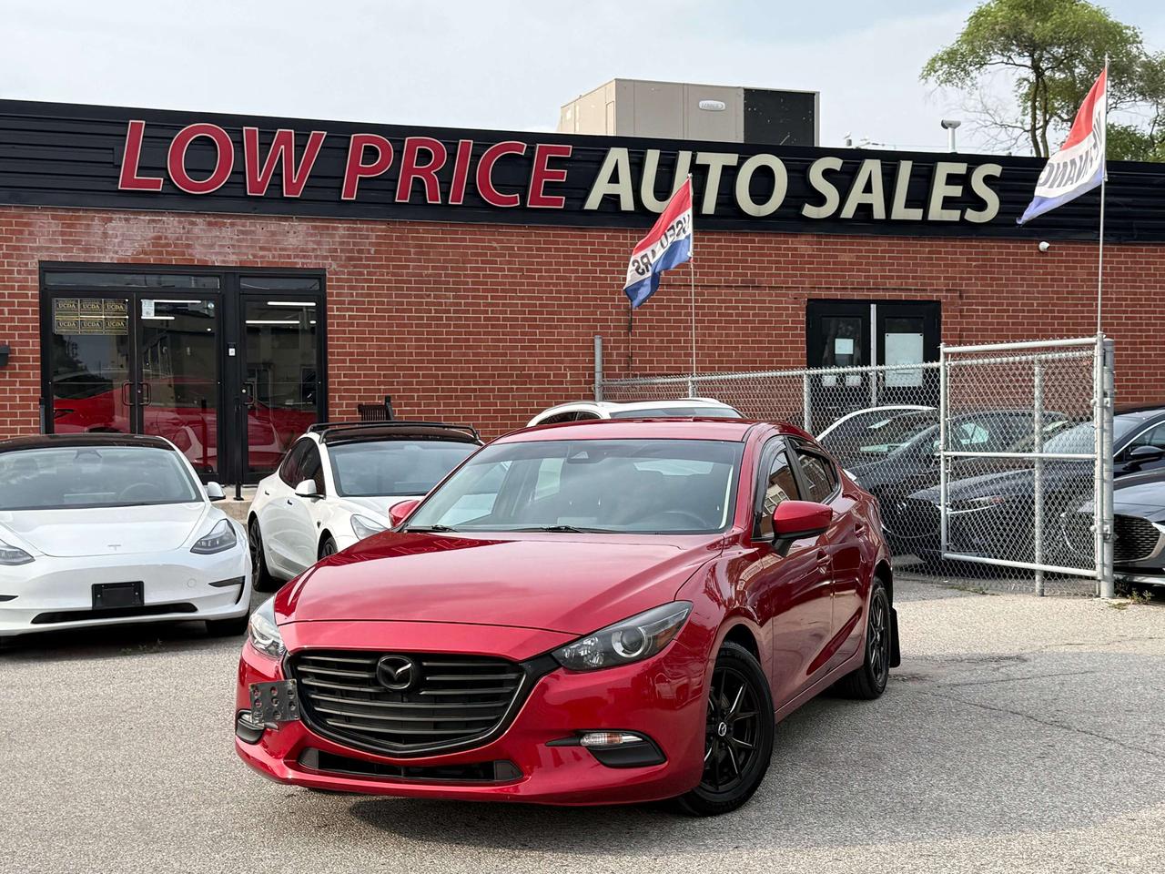 2018 Mazda MAZDA3 GX l Automatic l FWD l 2.0L l 4Cyl l Reverse Cam l Photo0