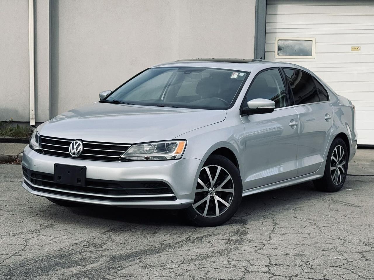 2016 Volkswagen Jetta Sedan Auto 1.8TSport  CleanCarfax BackUpCamera 2Rim&Tire Photo