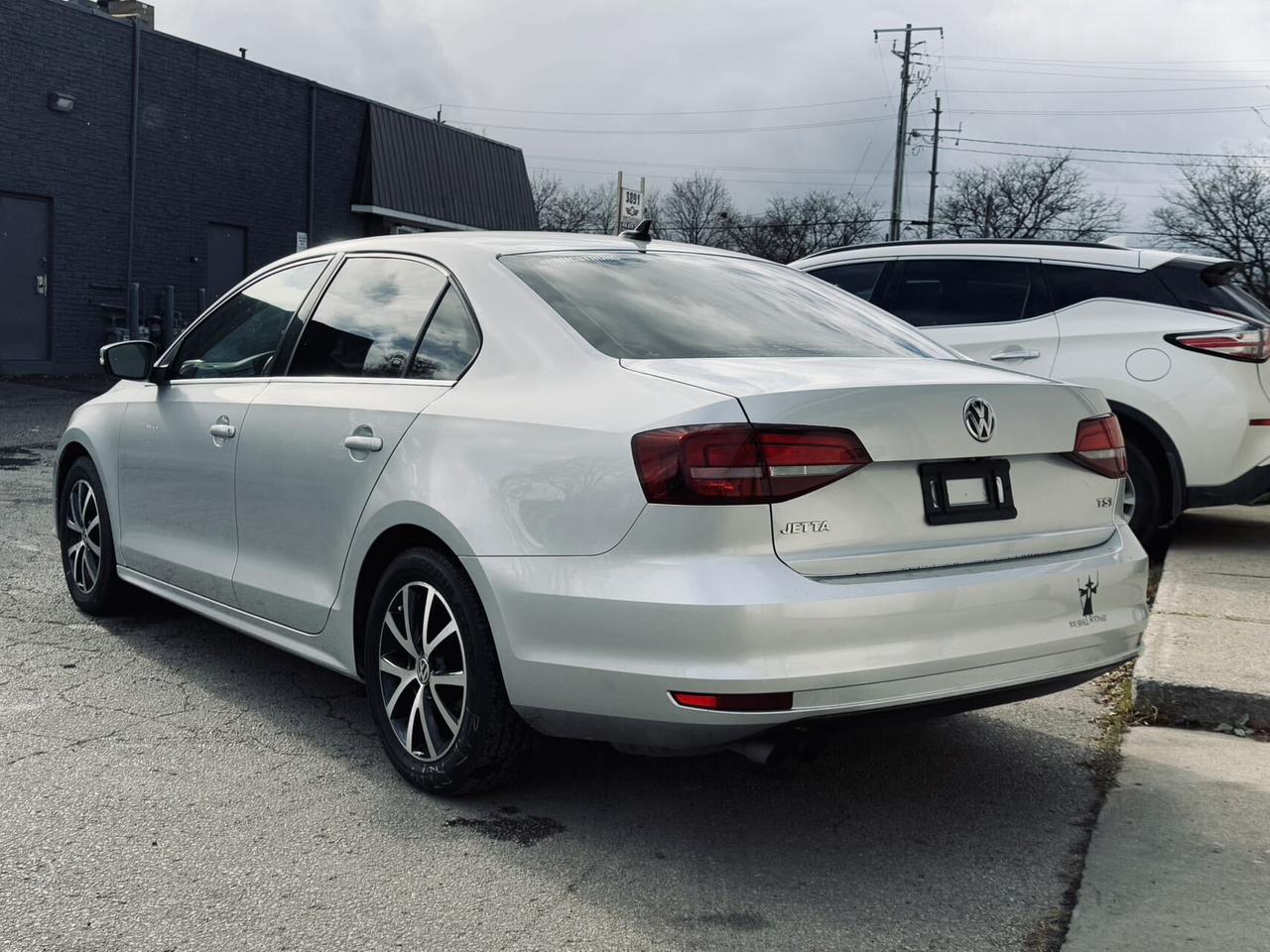 2016 Volkswagen Jetta Sedan Auto 1.8TSport  CleanCarfax BackUpCamera 2Rim&Tire Photo